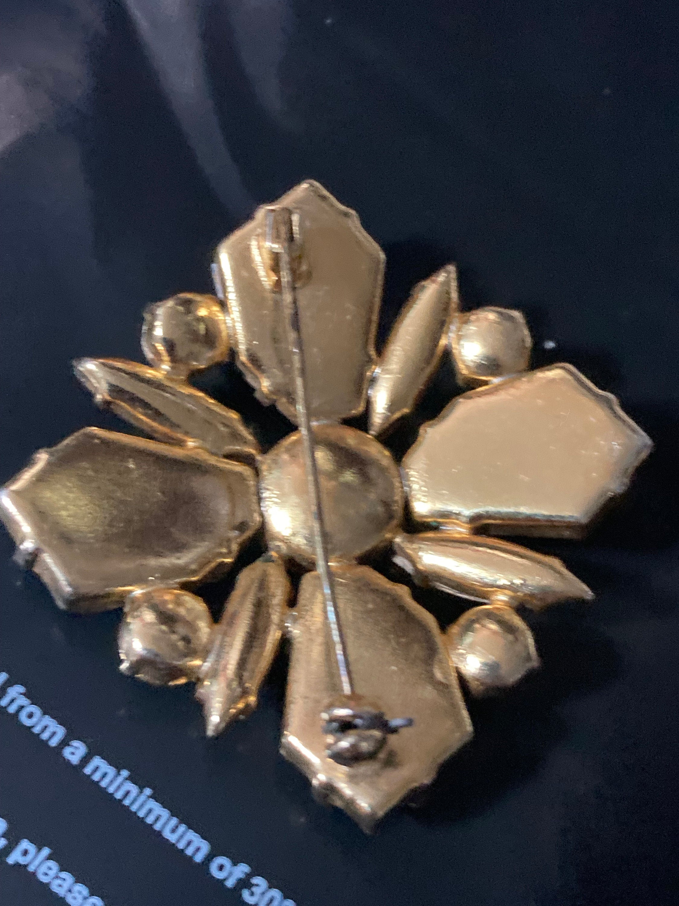 Large vintage modernist gold tone brown cognac glass star brooch