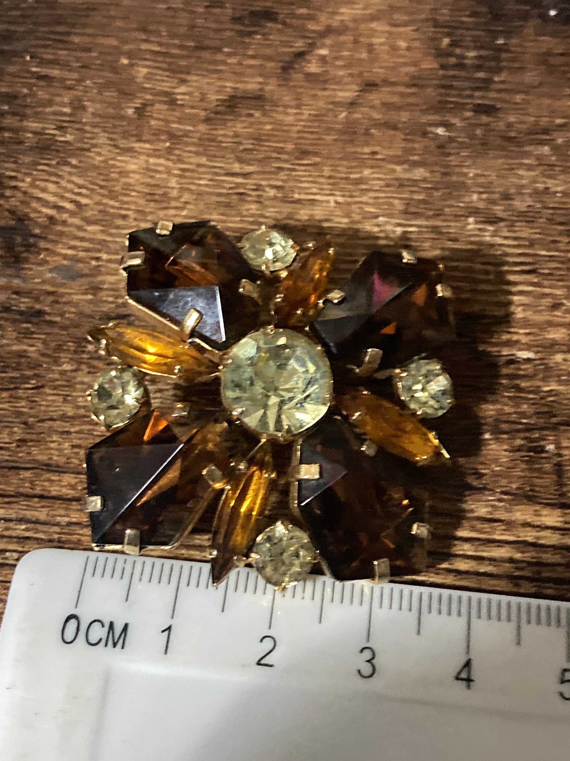 Large vintage modernist gold tone brown cognac glass star brooch