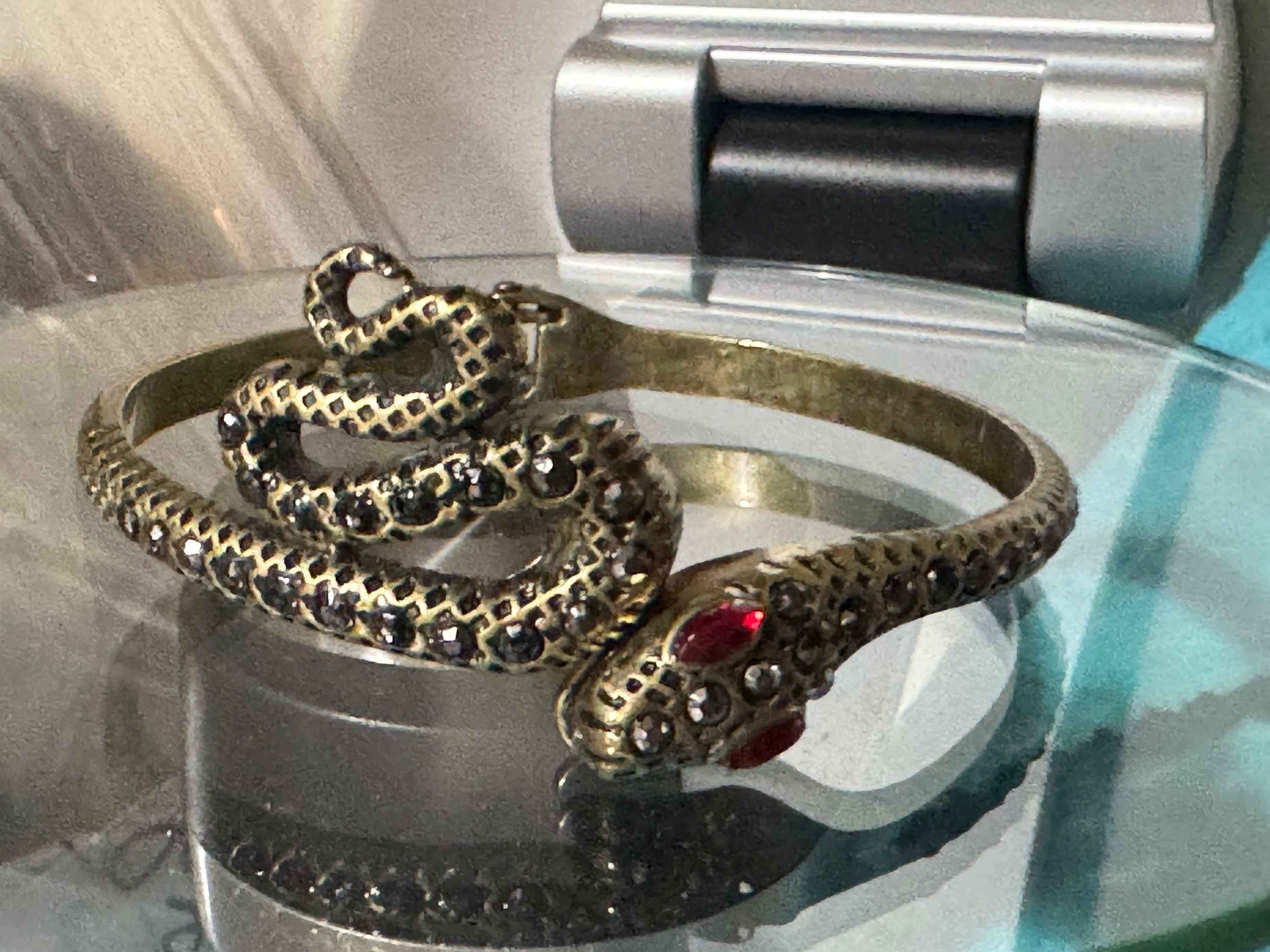 Antique gold tone marcasite and ruby paste set snake hinged clamper bangle bracelet