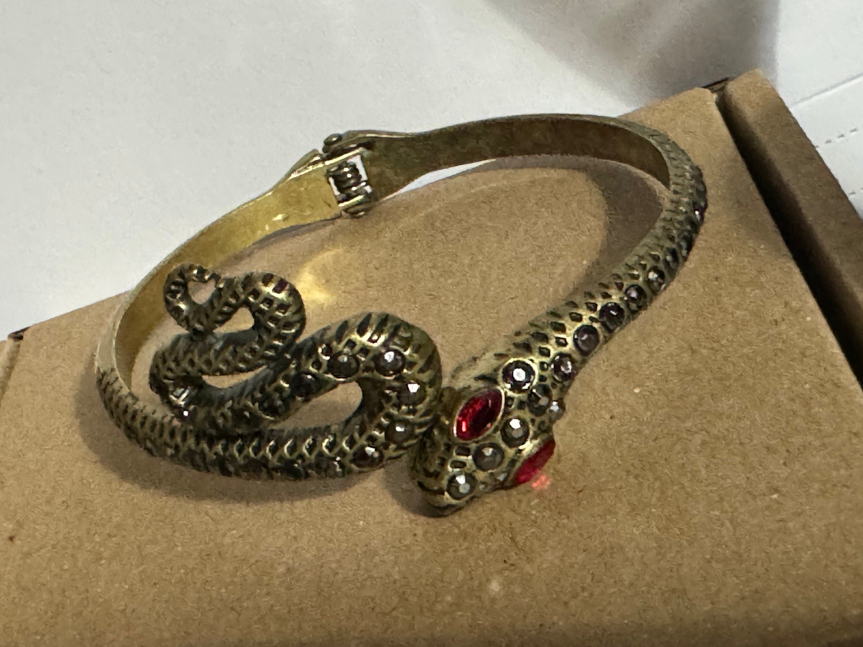 Antique gold tone marcasite and ruby paste set snake hinged clamper bangle bracelet