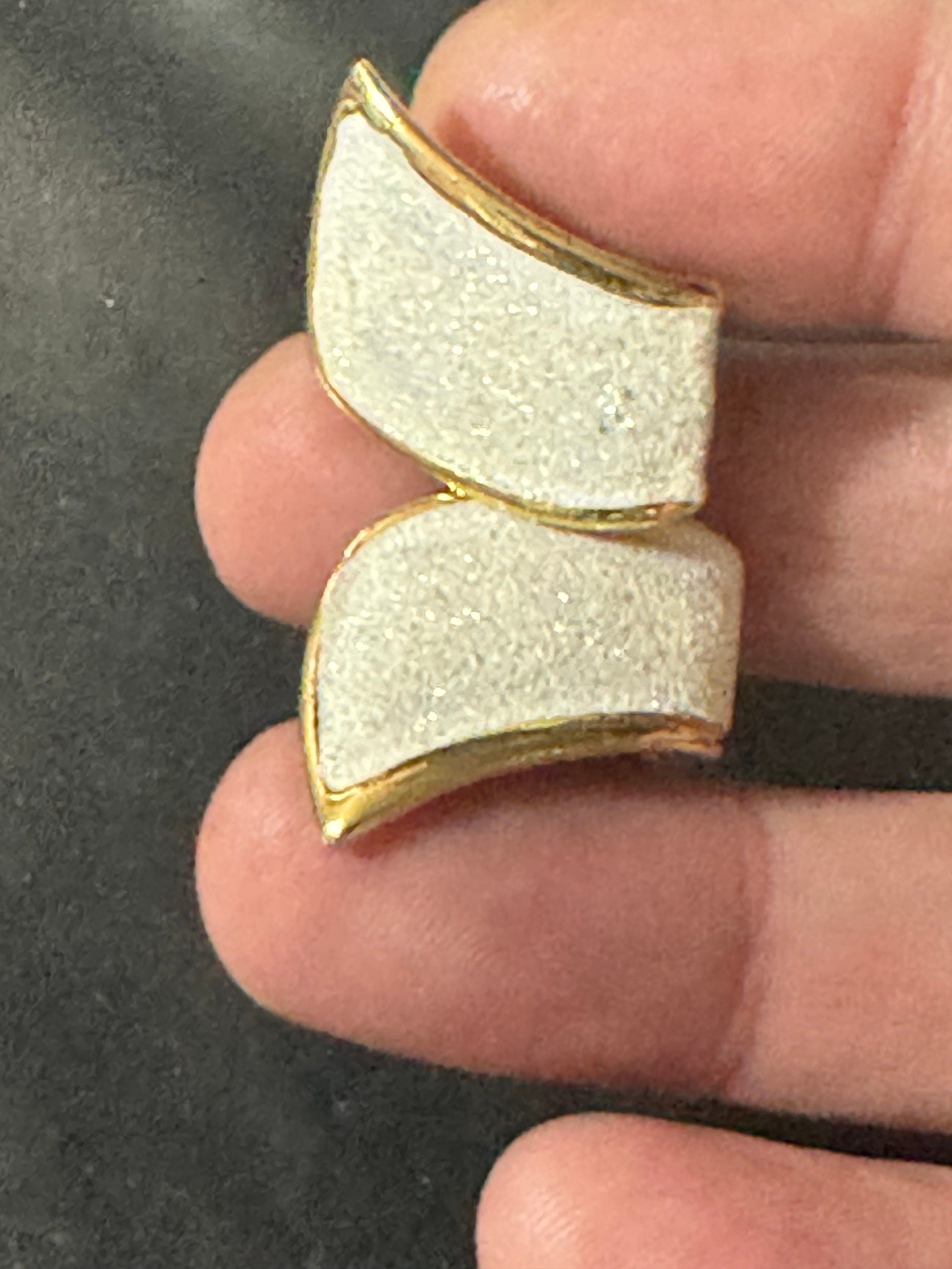 Vintage 1980s gold tone abstract white glitter clip on earrings