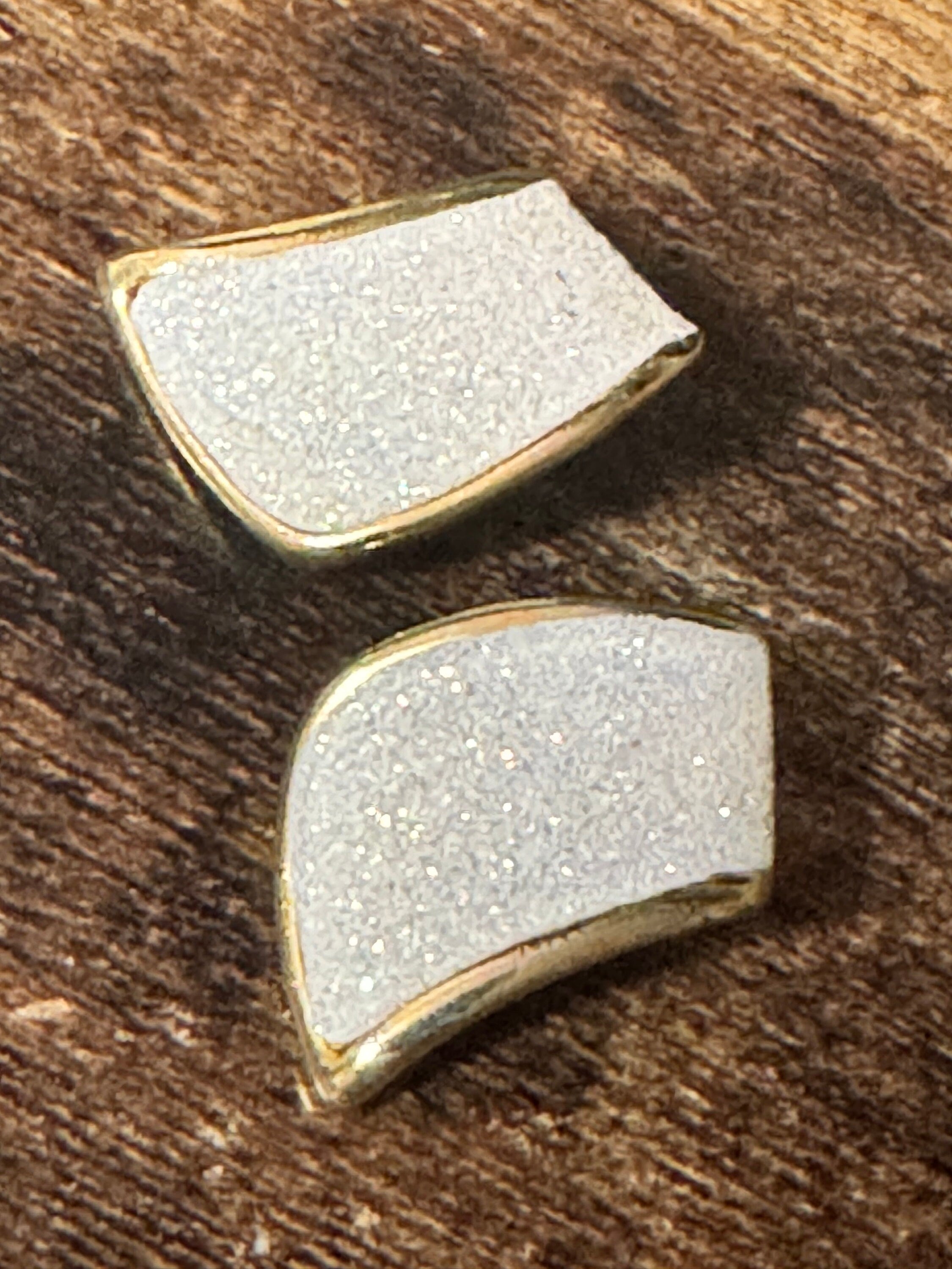 Vintage 1980s gold tone abstract white glitter clip on earrings