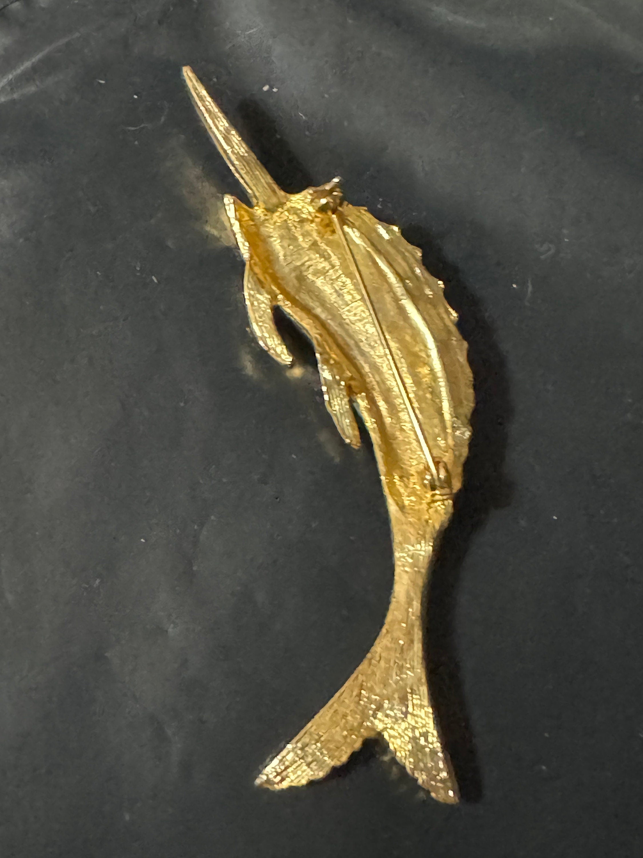 Vintage 1980s Gold Tone Marlin Brooch: Black Enamel, Emerald Green Eyes