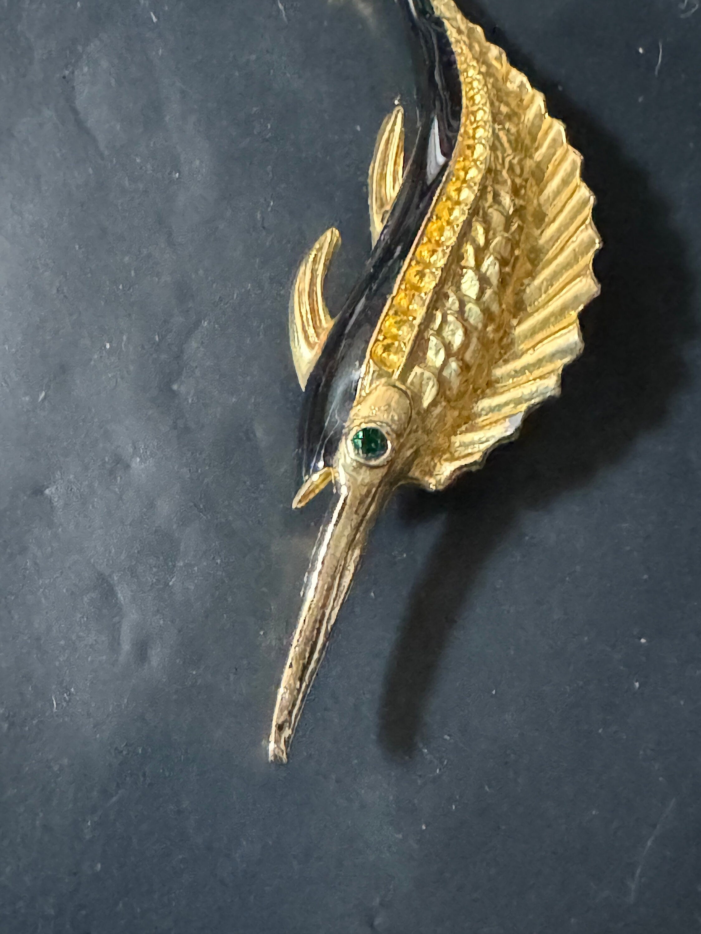 Vintage 1980s Gold Tone Marlin Brooch: Black Enamel, Emerald Green Eyes