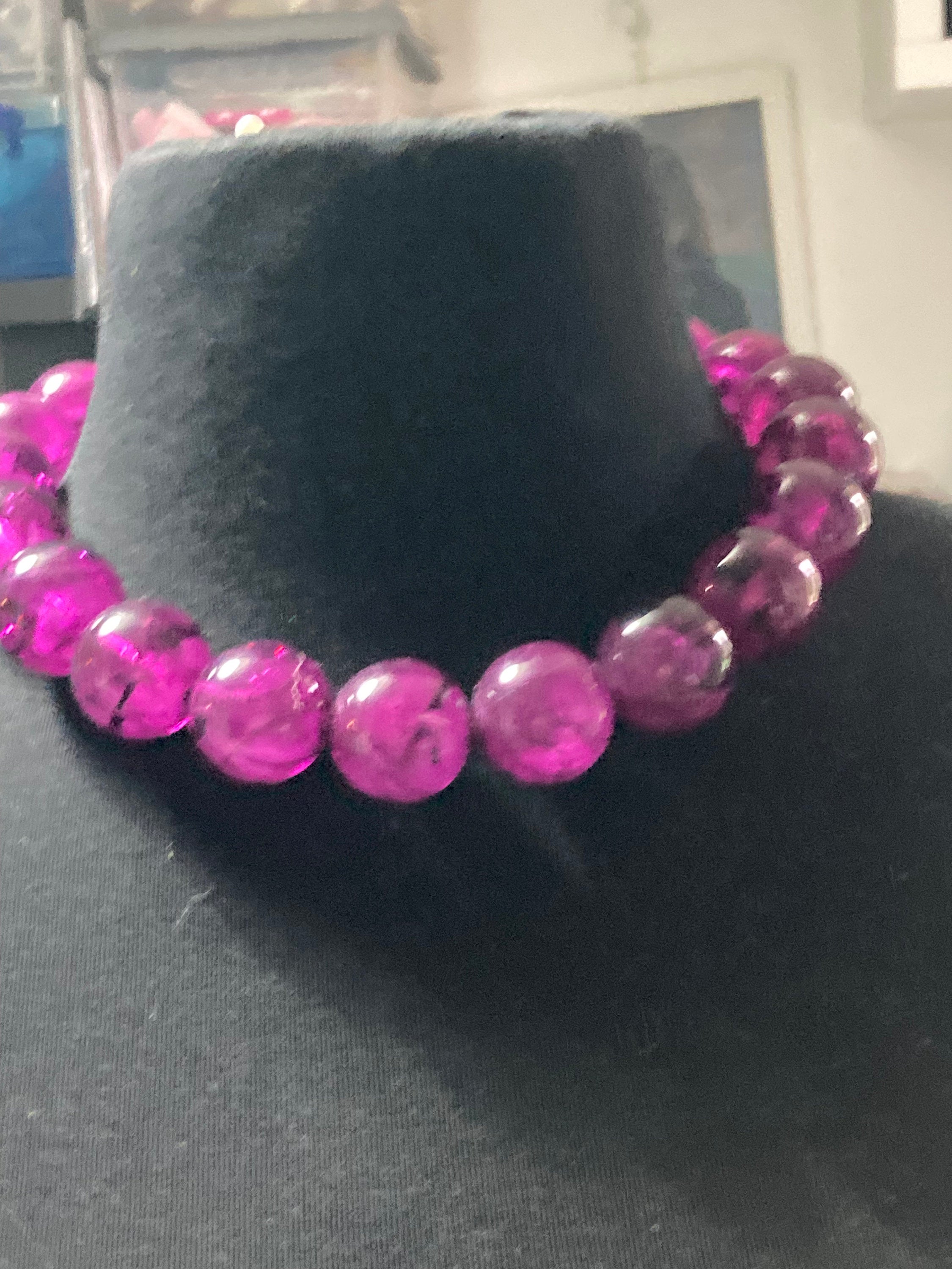 Oversized plastic beaded necklace purple tones