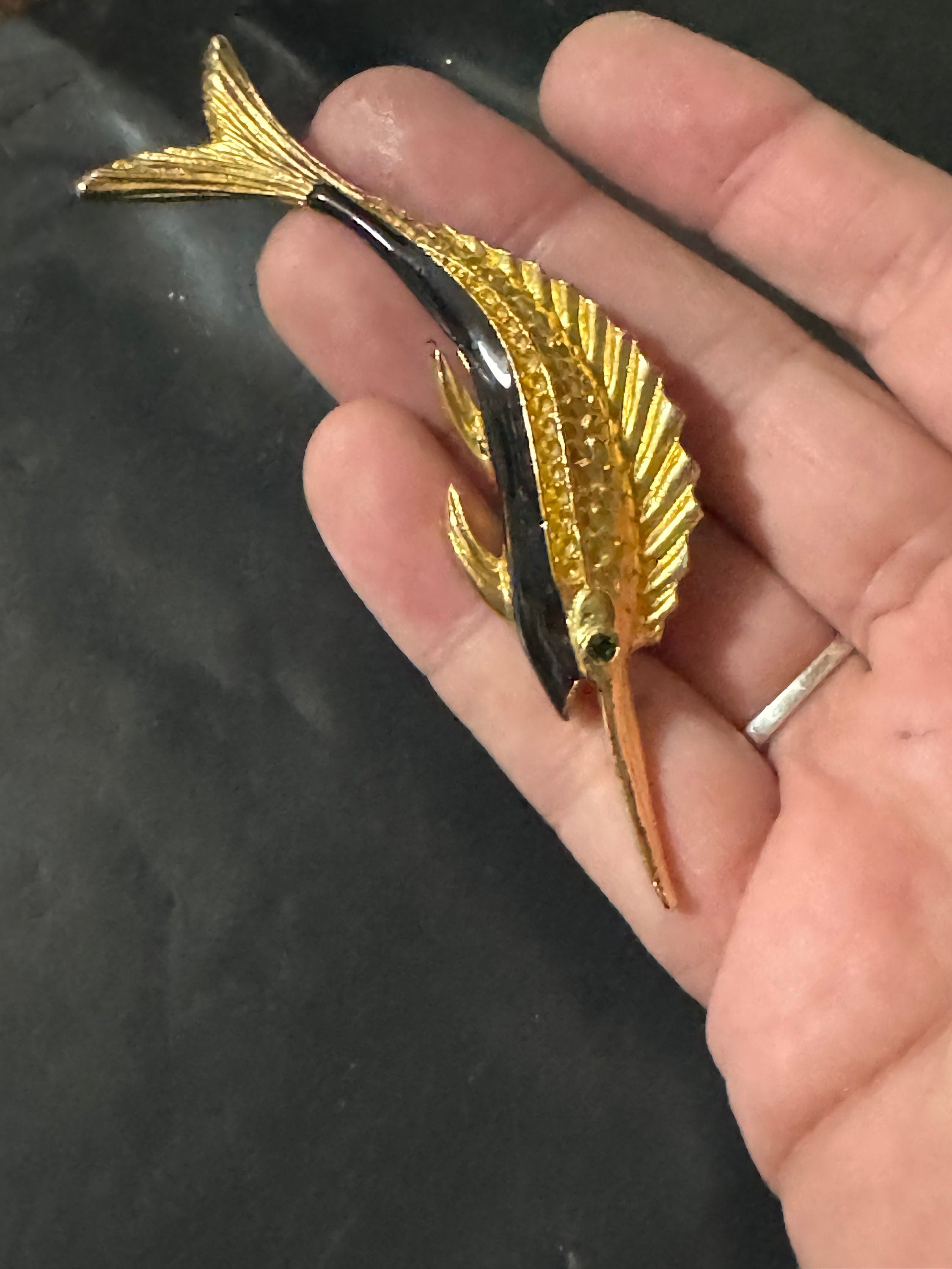 Vintage 1980s Gold Tone Marlin Brooch: Black Enamel, Emerald Green Eyes
