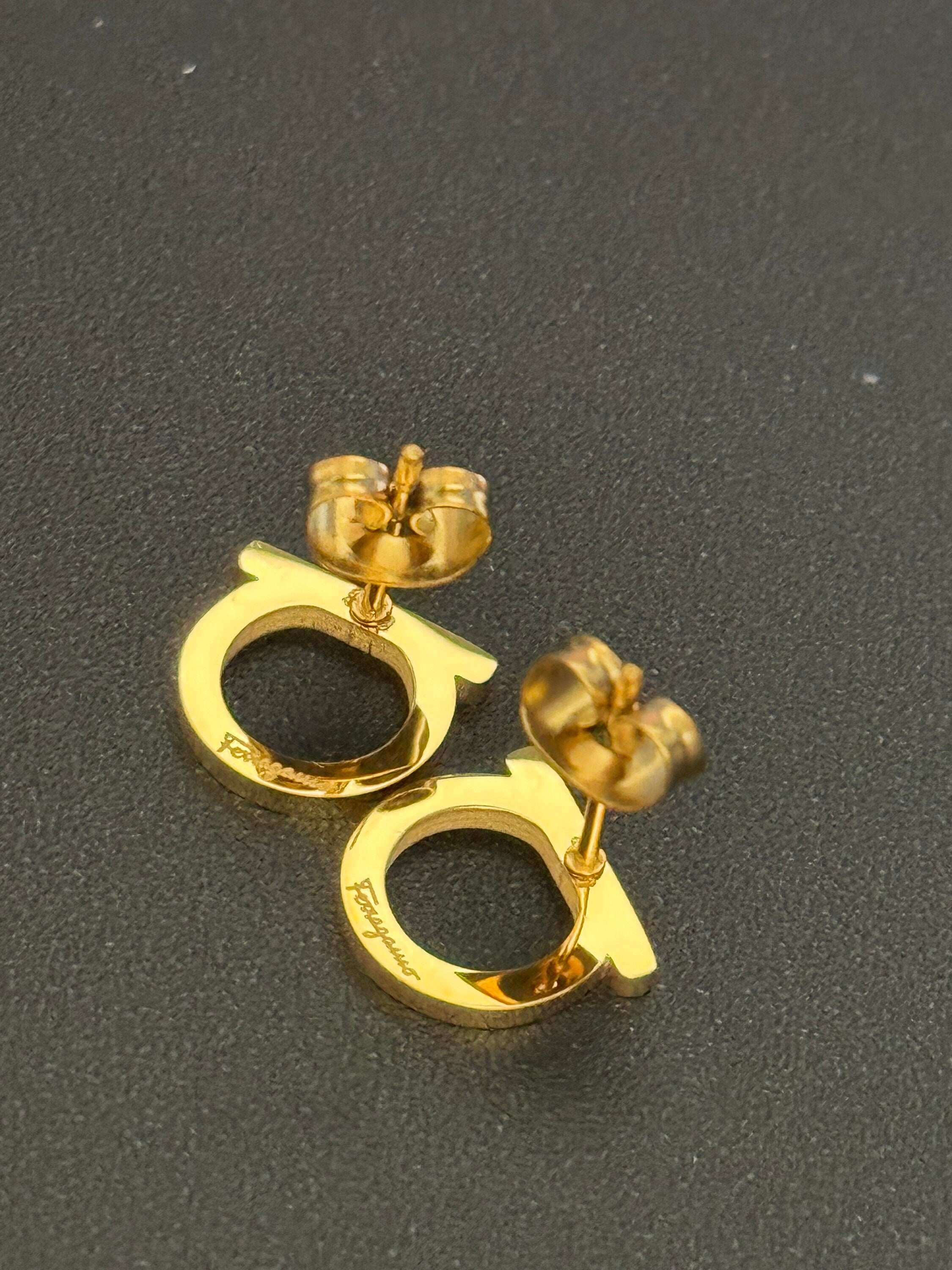 Signed salvatore ferragamo Italian small gold plated stud earrings for pierced ears