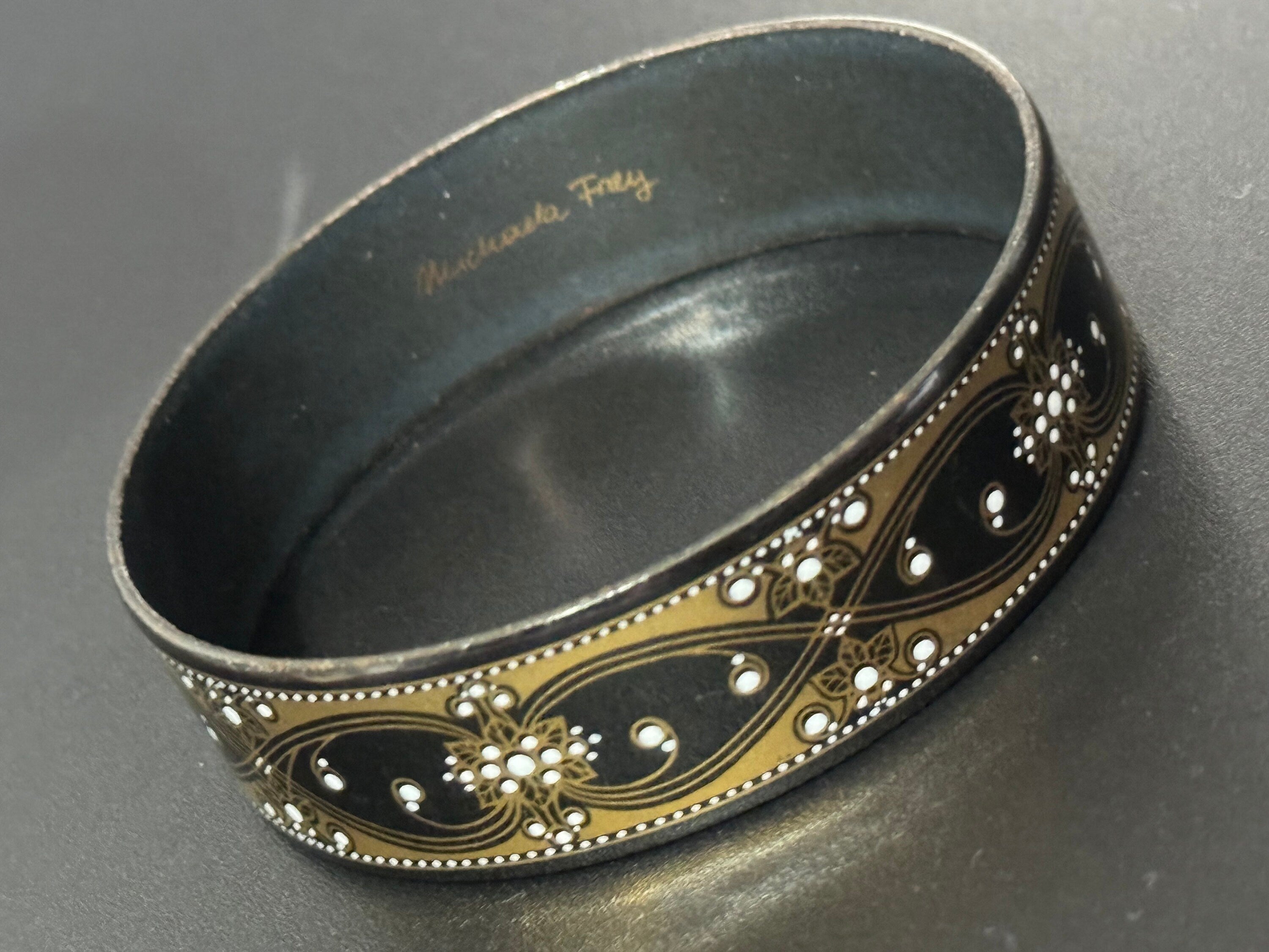 Vintage Michaela Frey black and gold enamel bangle, antique style wide from Austria