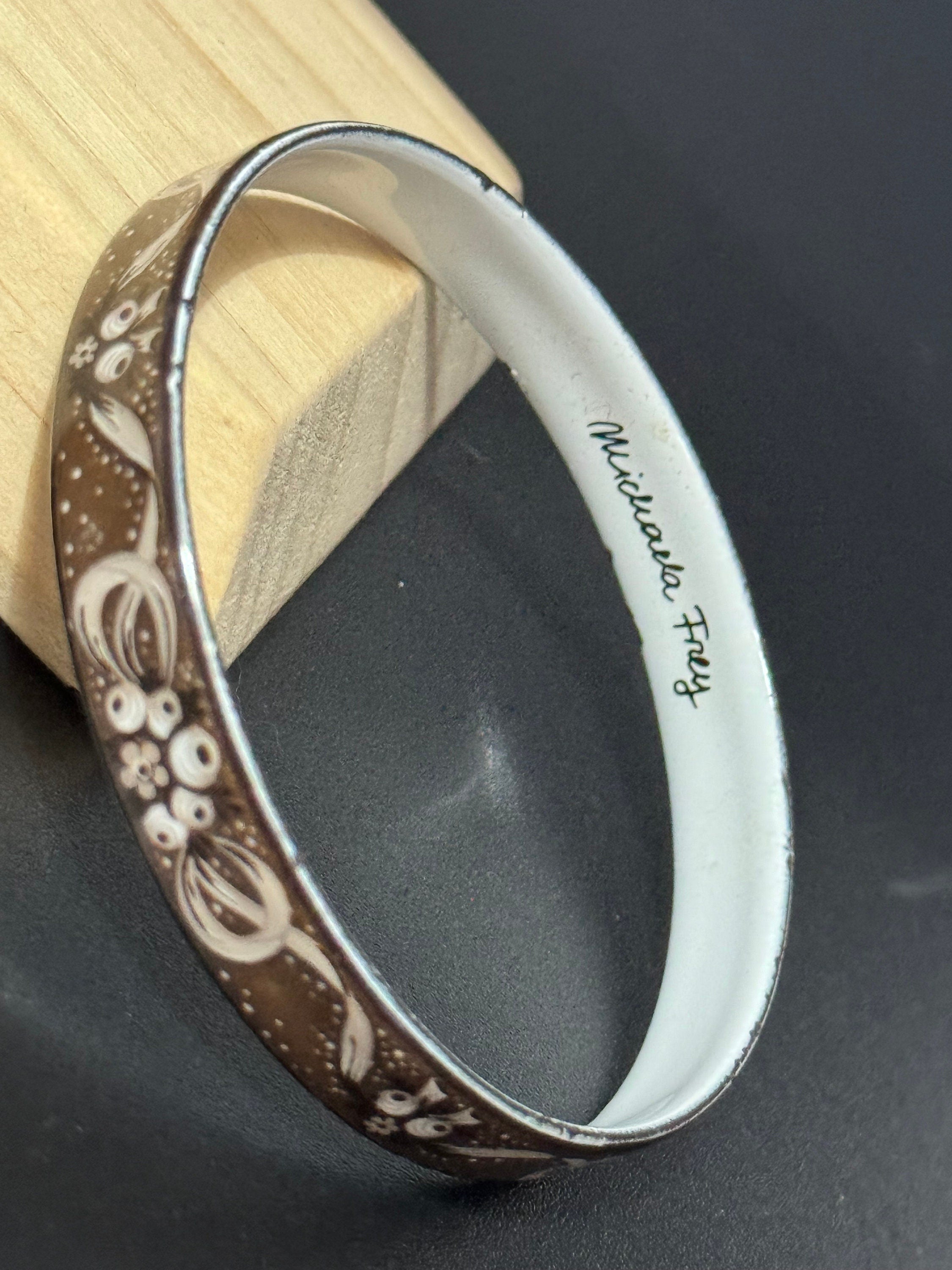 Austrian Vintage Michaela Frey black, white and gold enamel antique style floral bangle from Austria