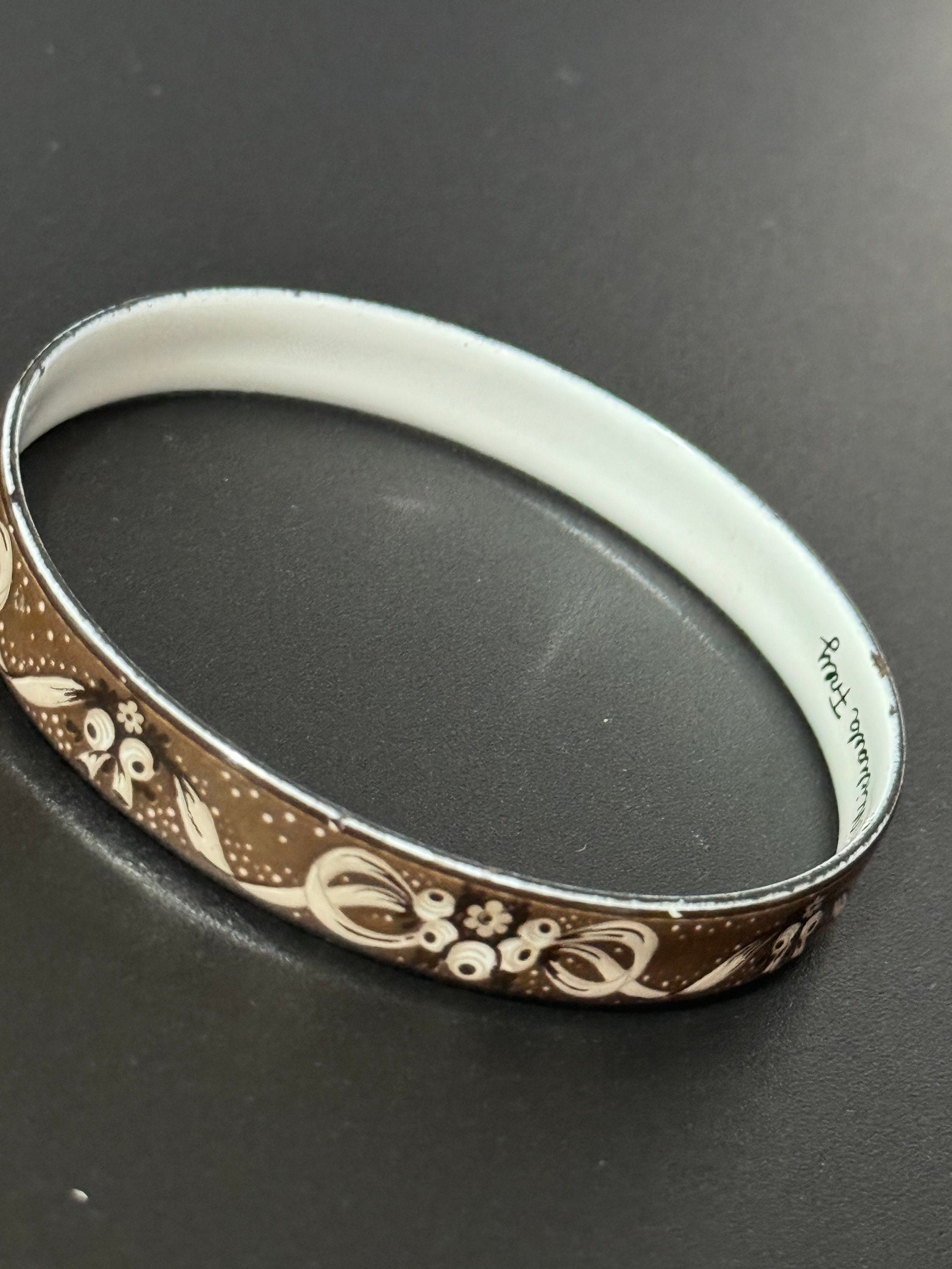 Austrian Vintage Michaela Frey black, white and gold enamel antique style floral bangle from Austria