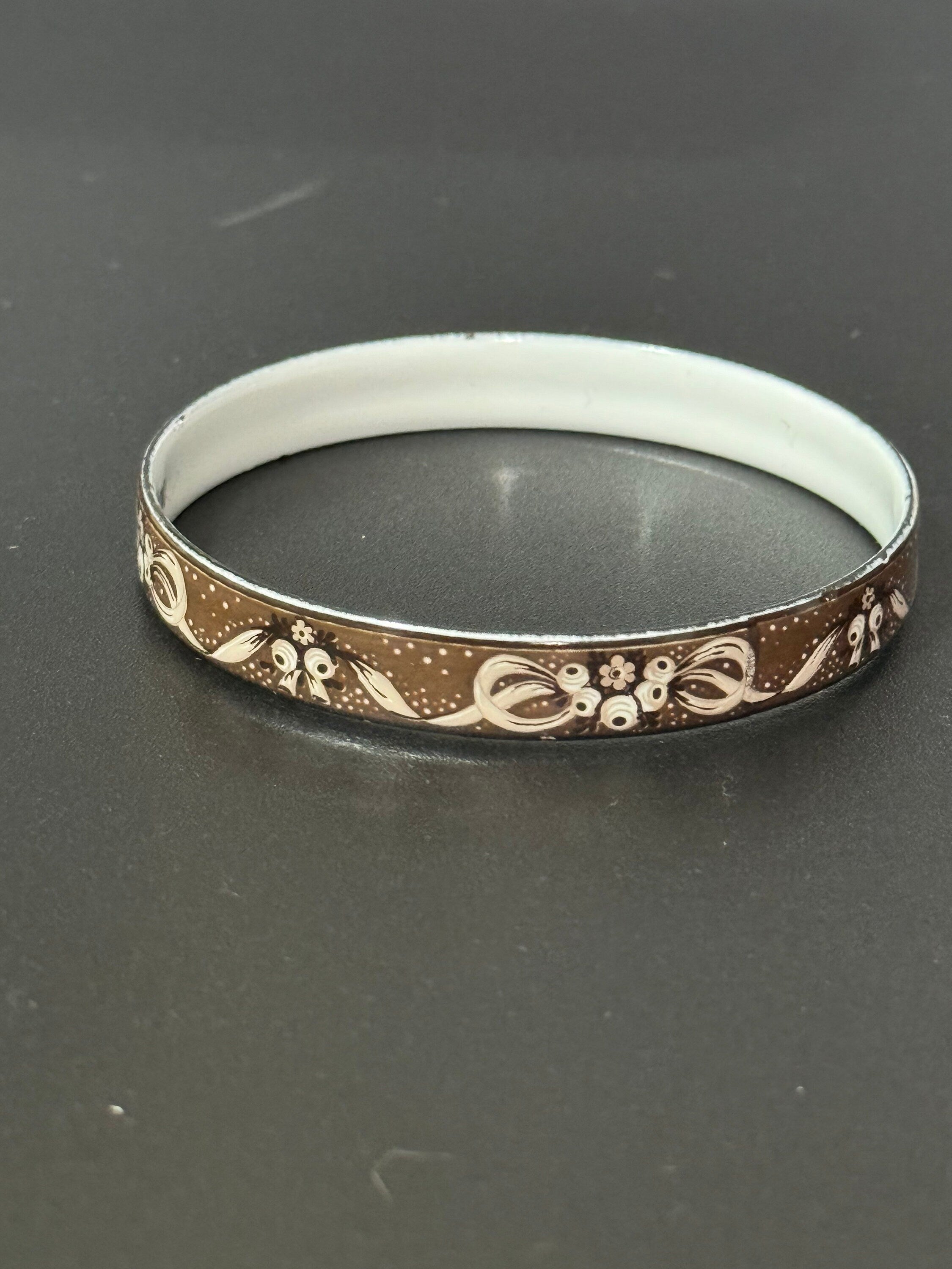 Austrian Vintage Michaela Frey black, white and gold enamel antique style floral bangle from Austria