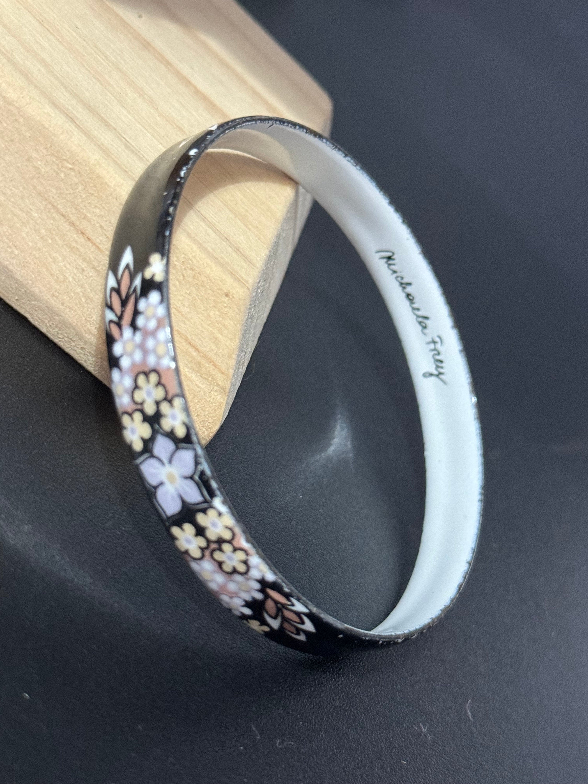 Austrian Vintage Michaela Frey black white and brown enamel antique style floral bangle from Austria