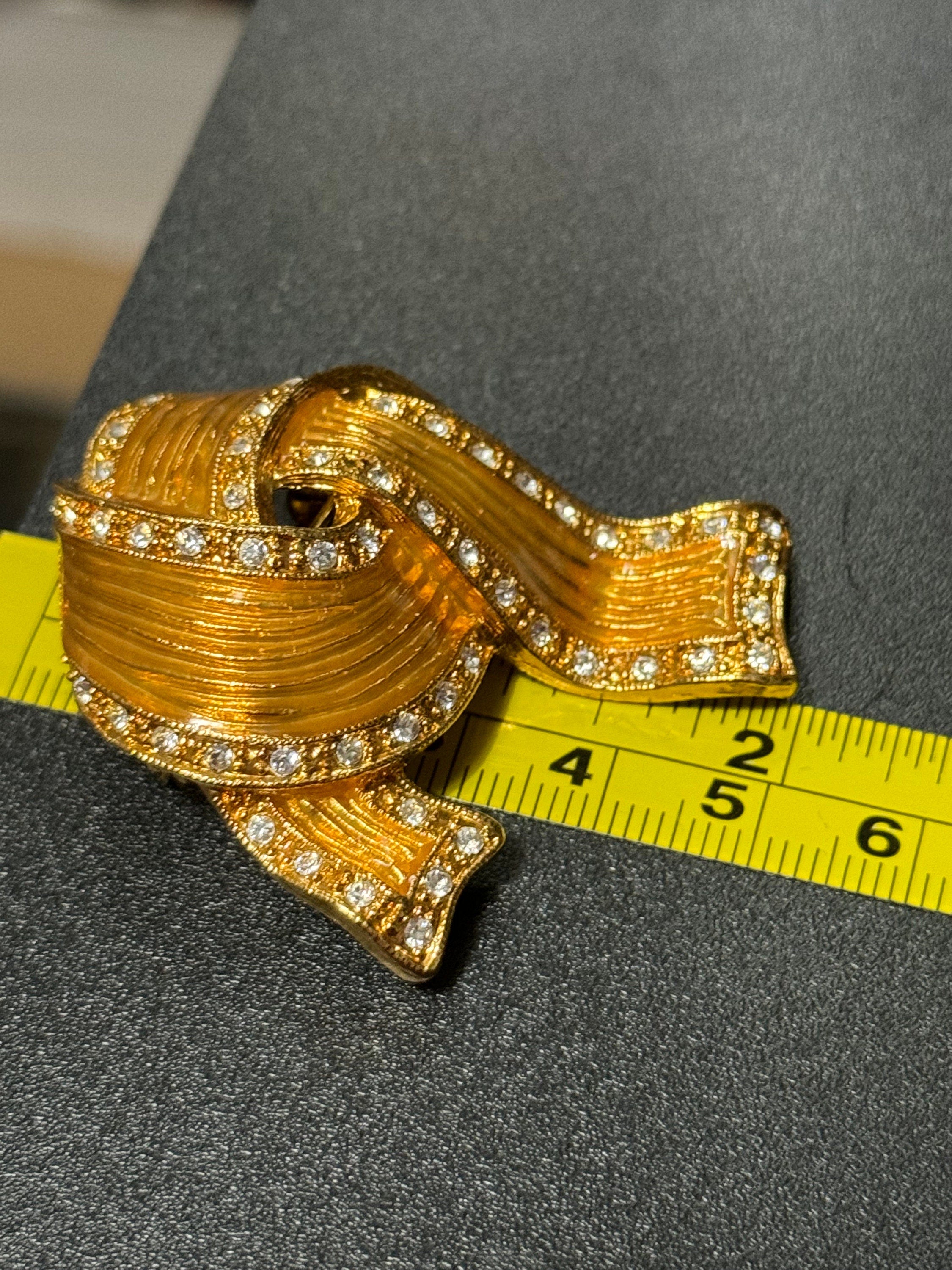 Signed JBK Camrose & Kross Jacqueline Kennedy gold tone diamanté ribbon JBK brooch 1980s