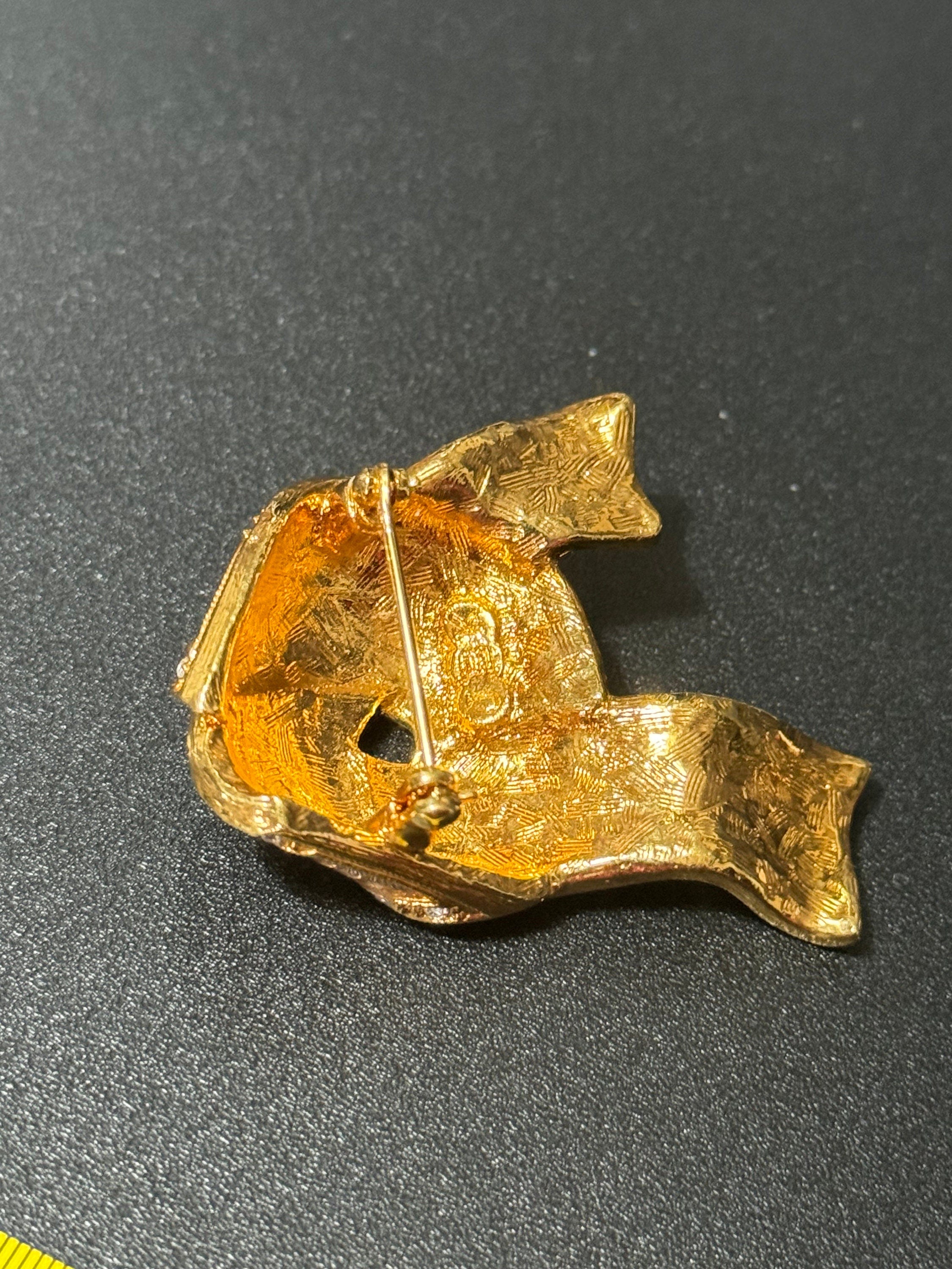 Signed JBK Camrose & Kross Jacqueline Kennedy gold tone diamanté ribbon JBK brooch 1980s