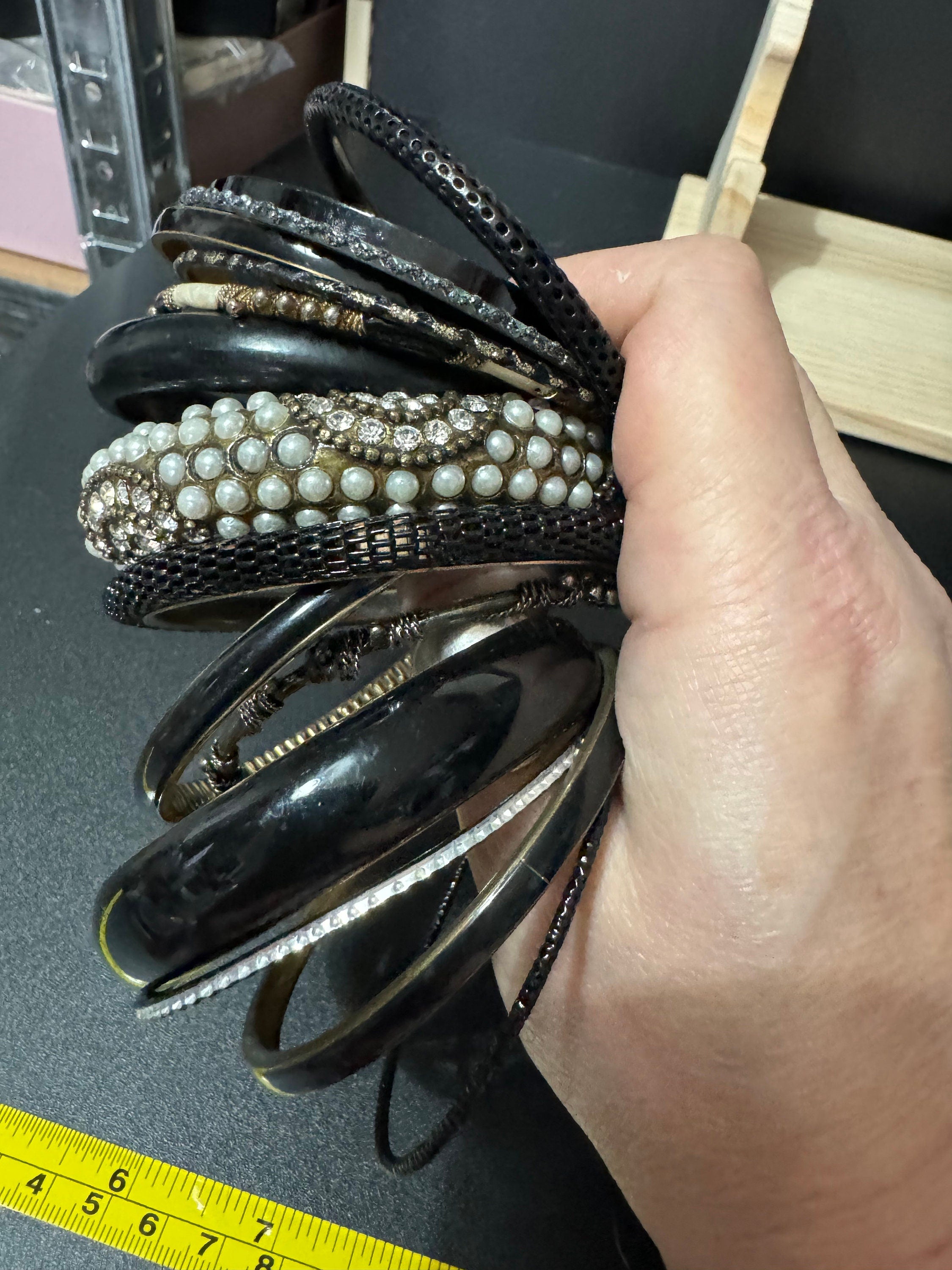 Armful of vintage black and gold tones slim and wide tacking boho bangles