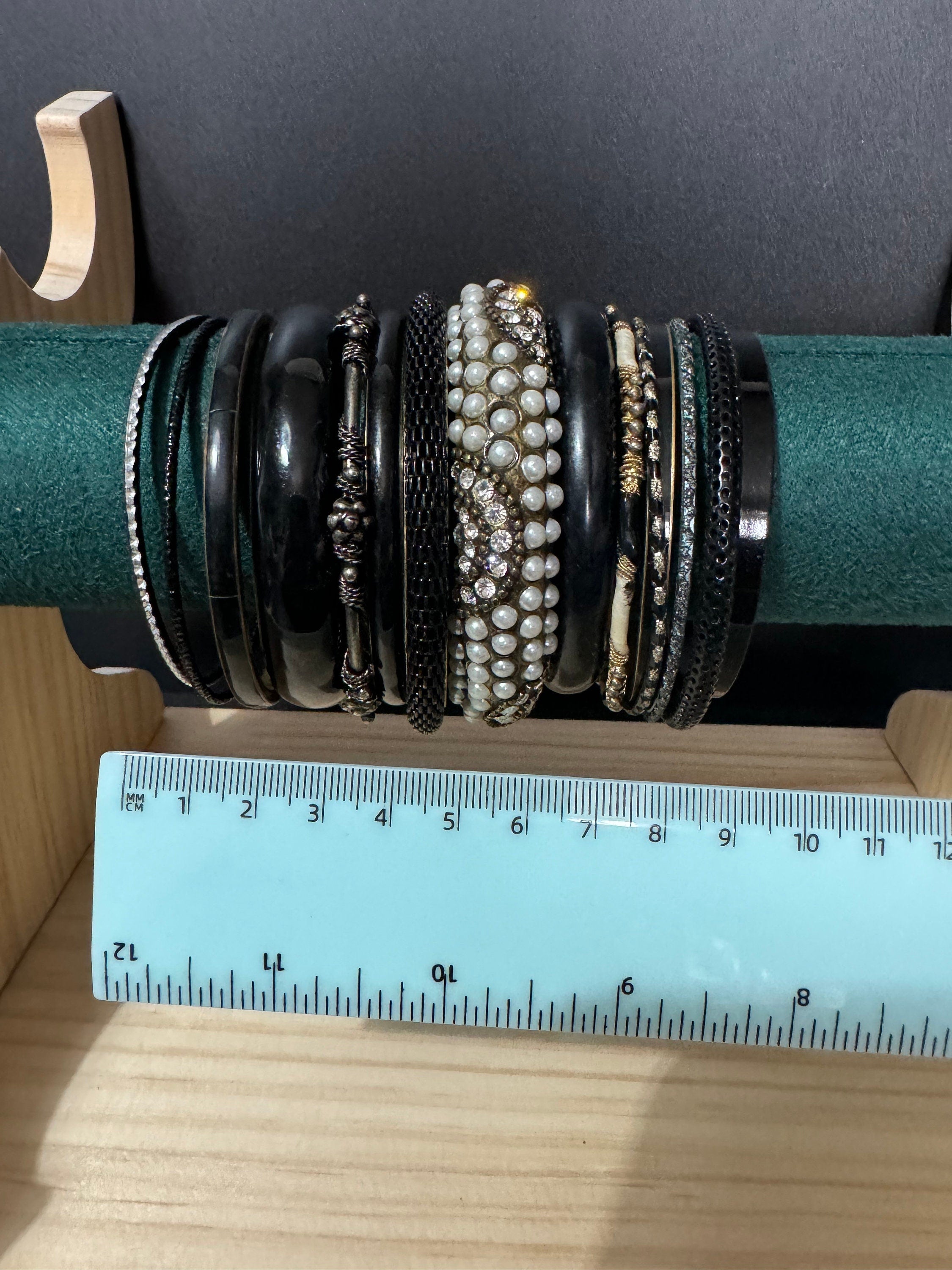 Armful of vintage black and gold tones slim and wide tacking boho bangles