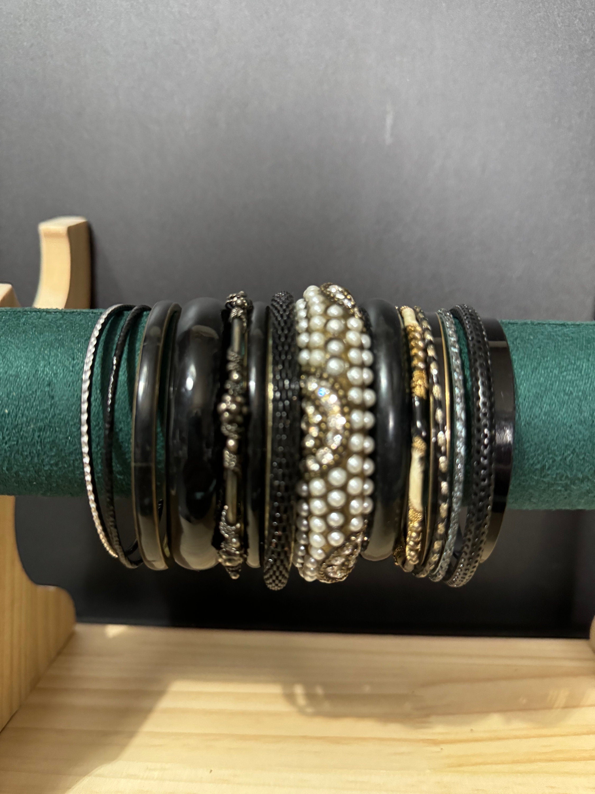Armful of vintage black and gold tones slim and wide tacking boho bangles