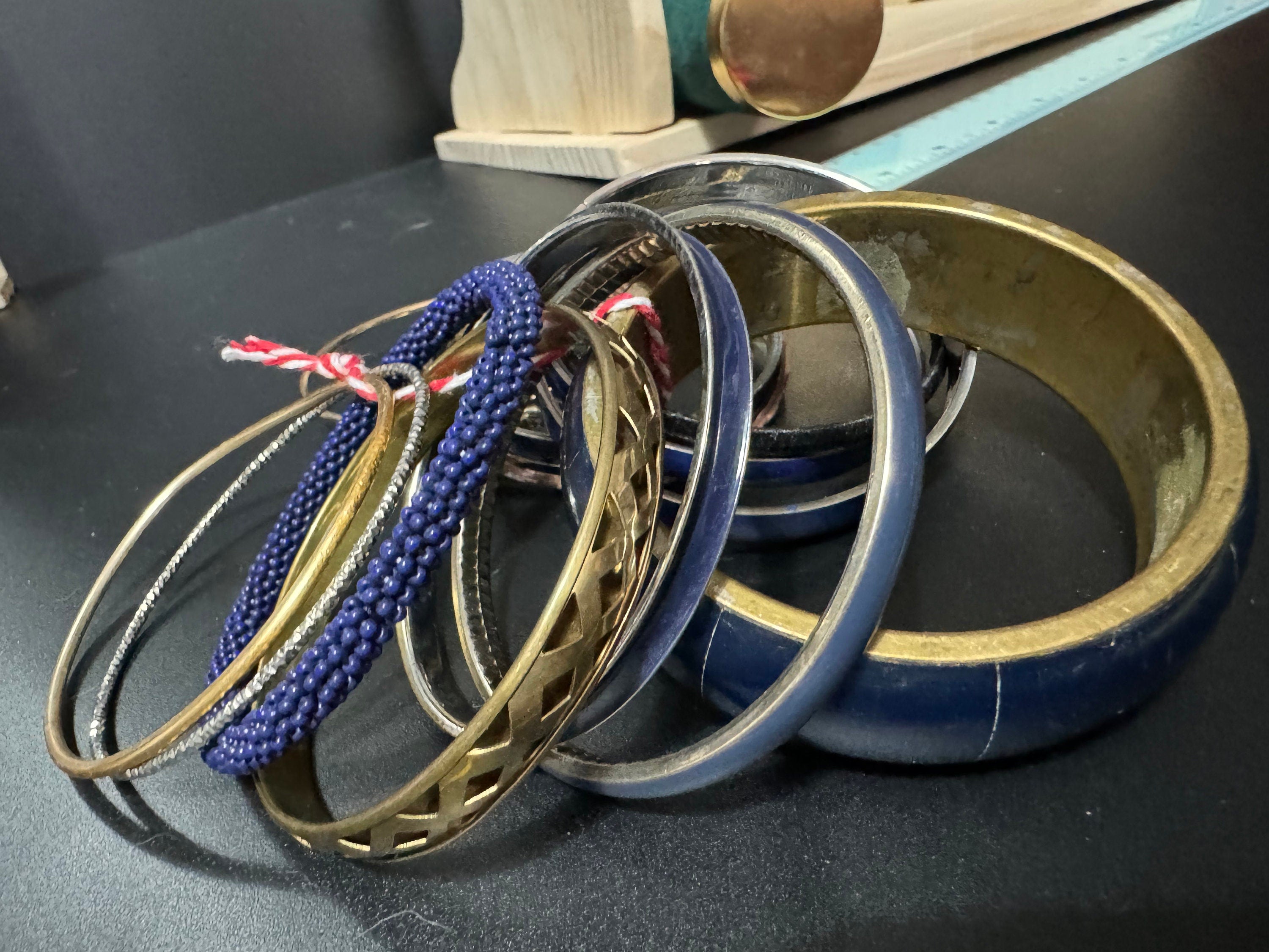 Armful of vintage Navy blue and gold tones slim and wide tacking boho bangles