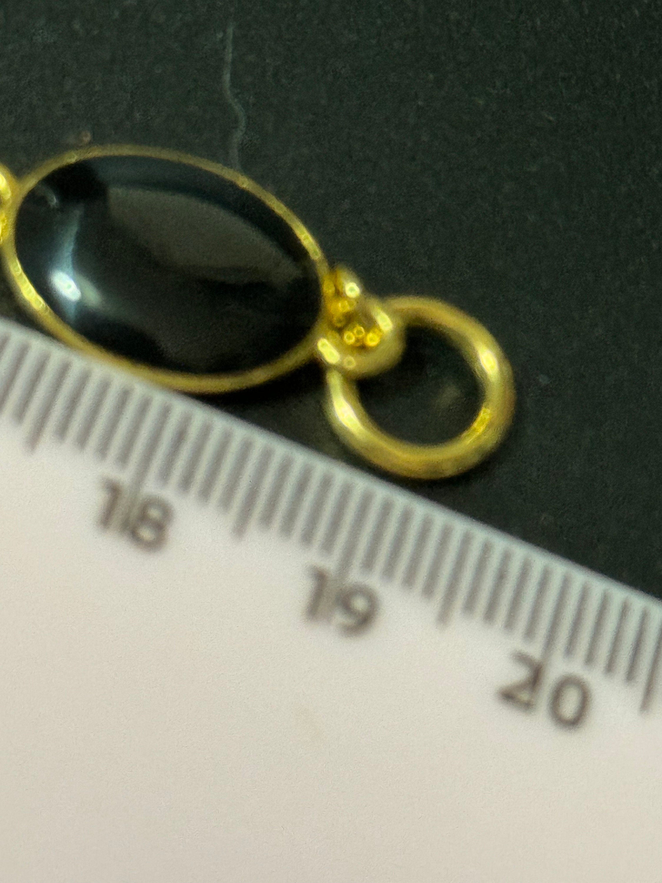 Vintage gold tone black and cream oval enamel panel link bracelet