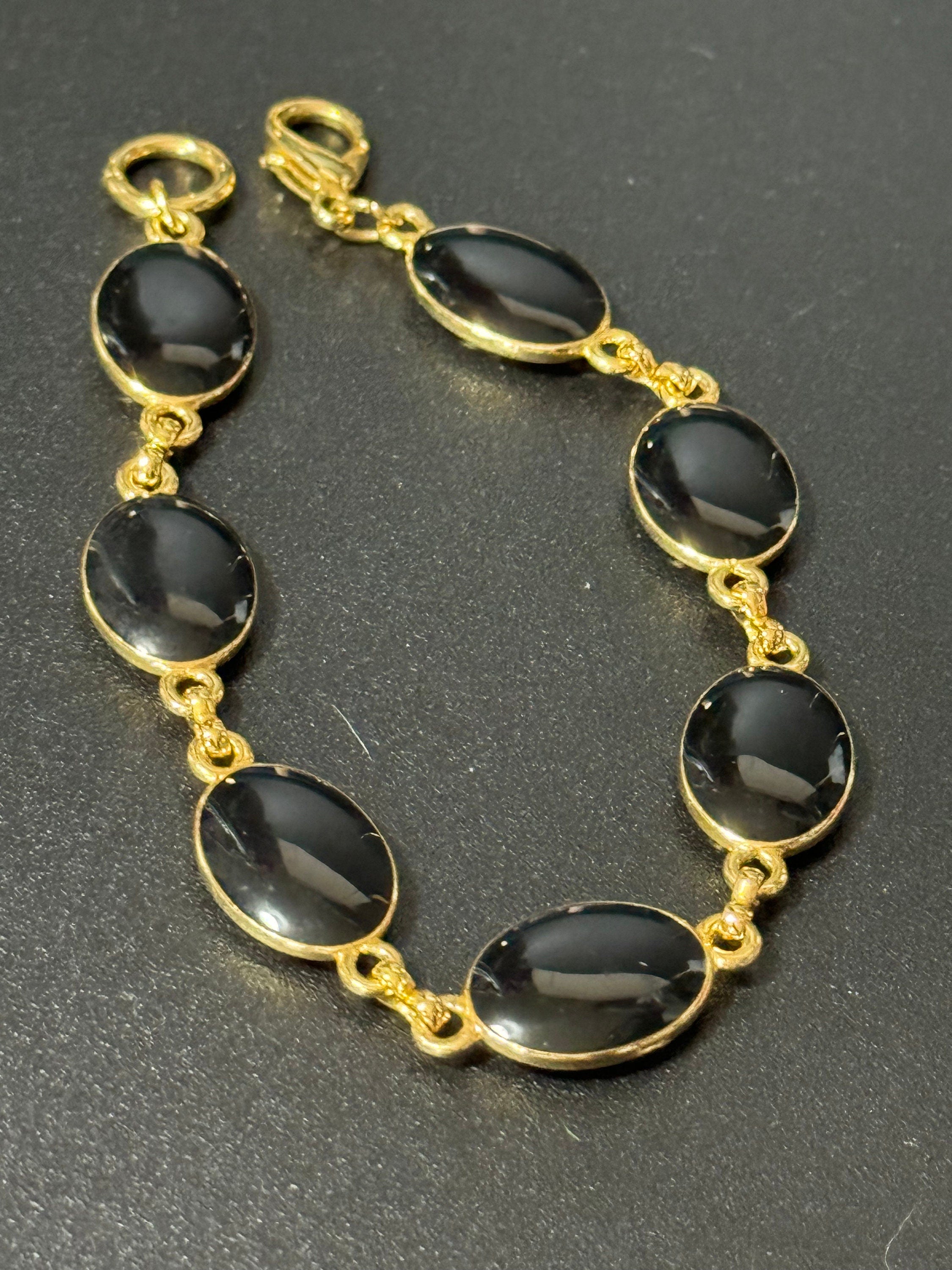 Vintage gold tone black and cream oval enamel panel link bracelet
