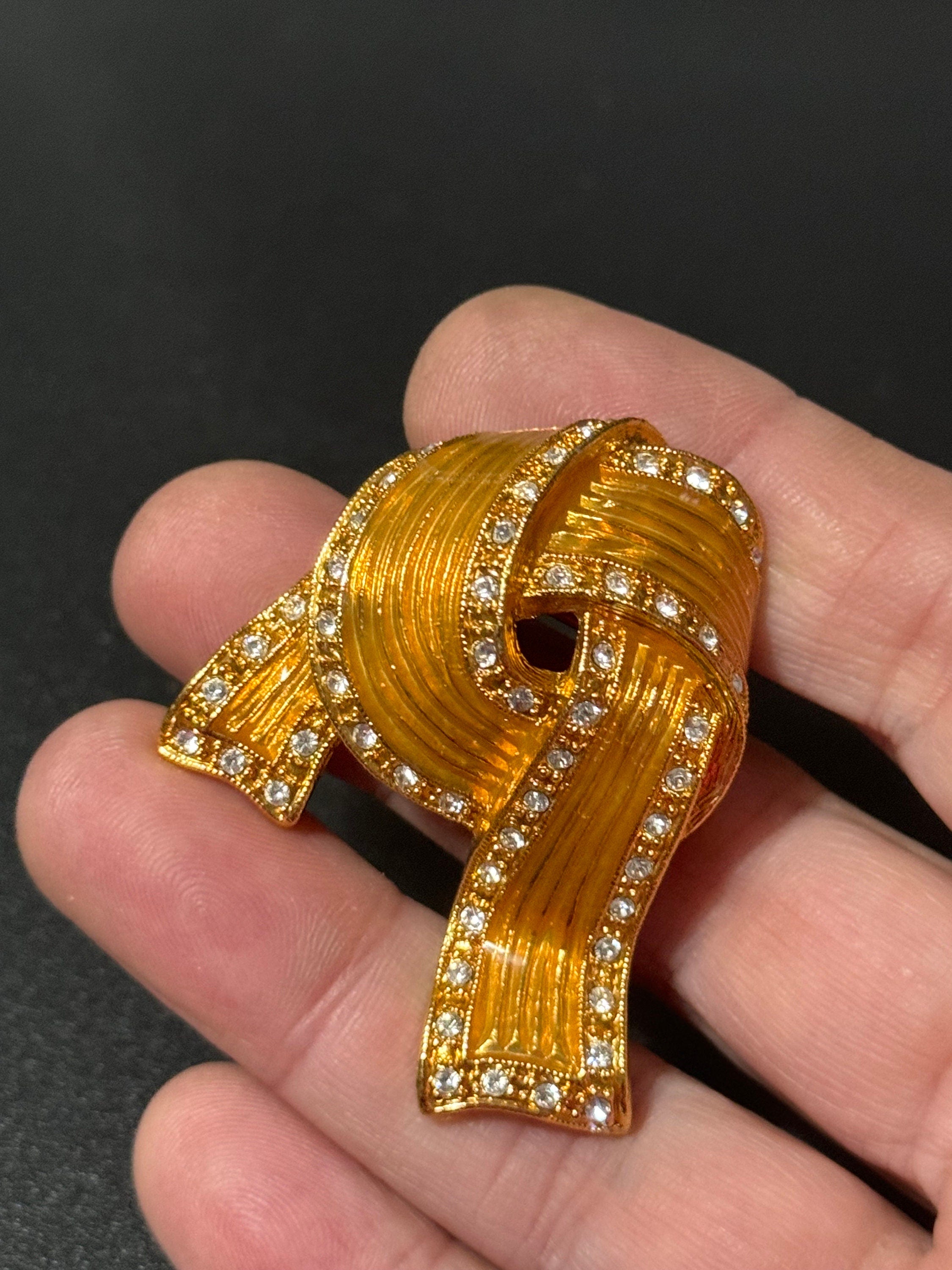 Signed JBK Camrose & Kross Jacqueline Kennedy gold tone diamanté ribbon JBK brooch 1980s