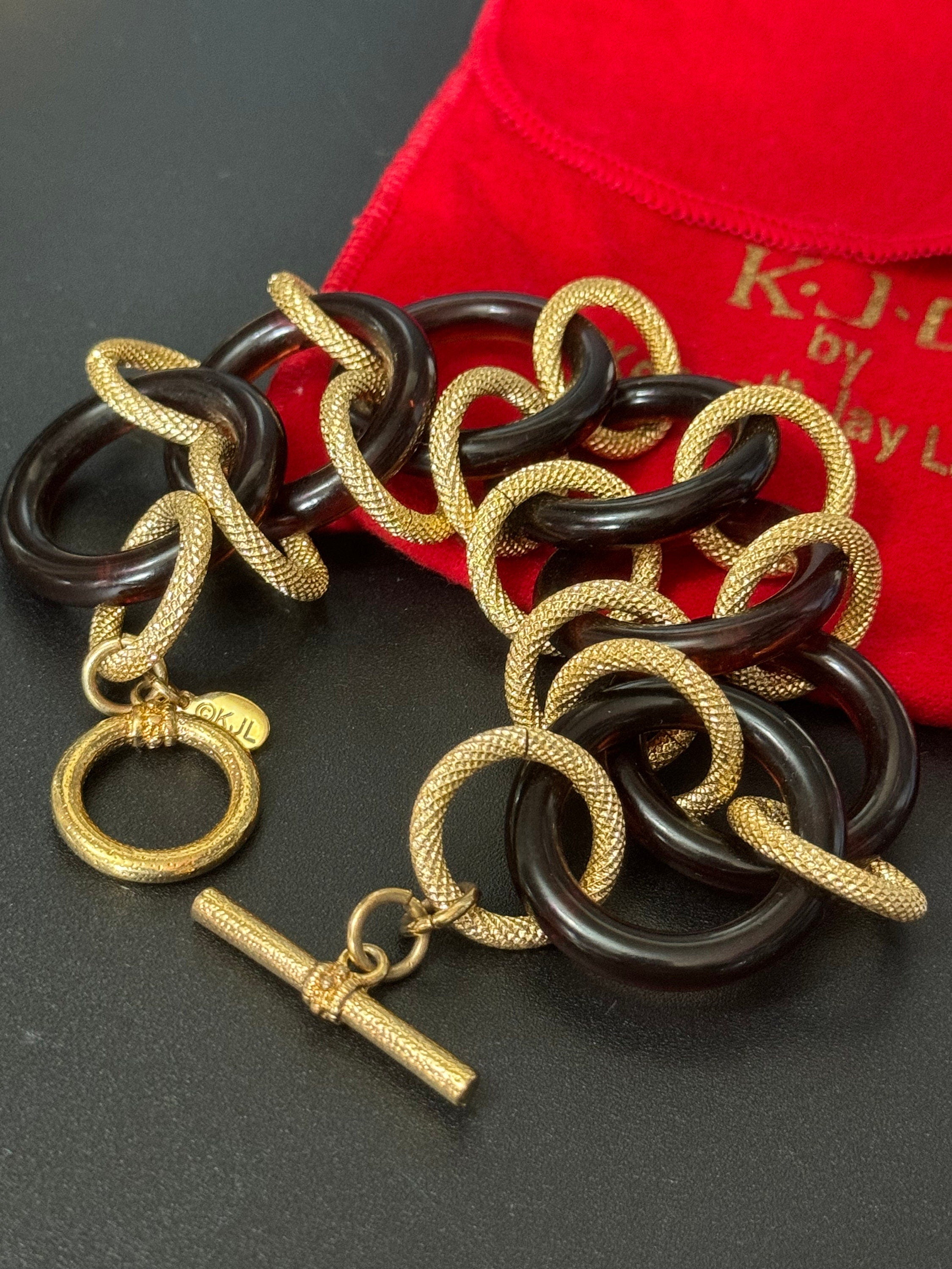 Signed KJL gold tone and faux tortoiseshell plastic link chunky wide curb link chain bracelet toggle closure