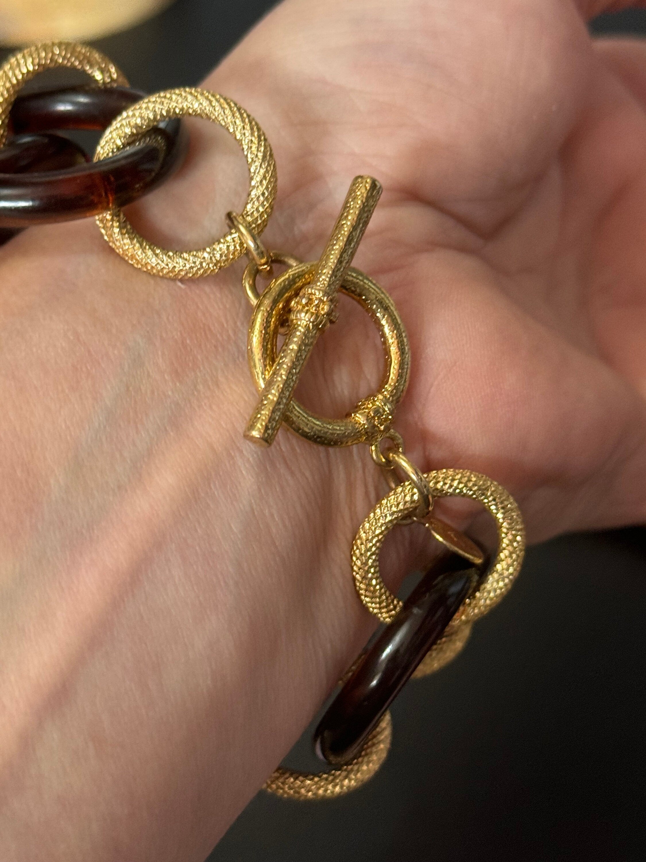 Signed KJL gold tone and faux tortoiseshell plastic link chunky wide curb link chain bracelet toggle closure