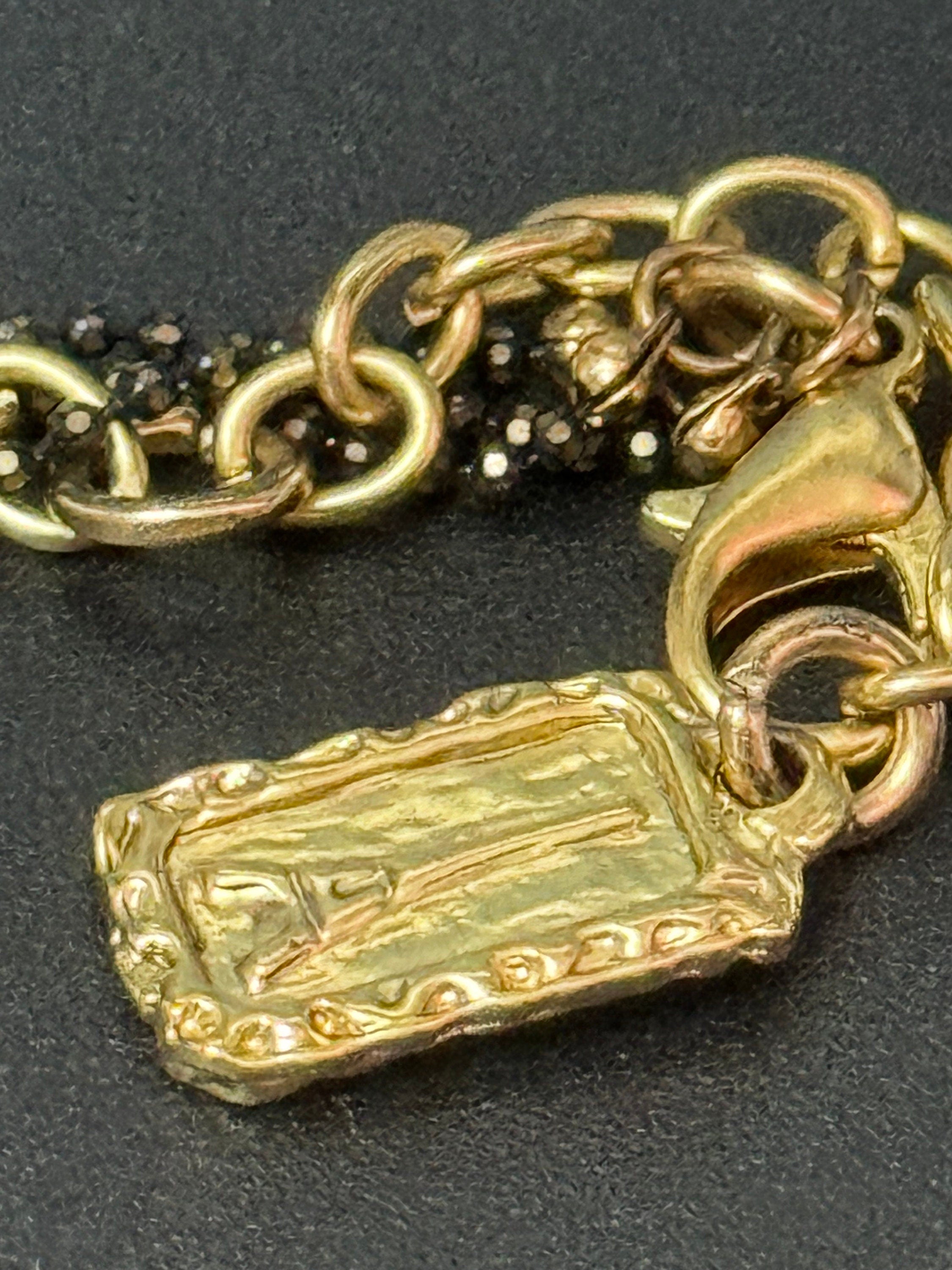 Signed Karine Sultan designer black and gold long medallion pendant tassel drop necklace couture