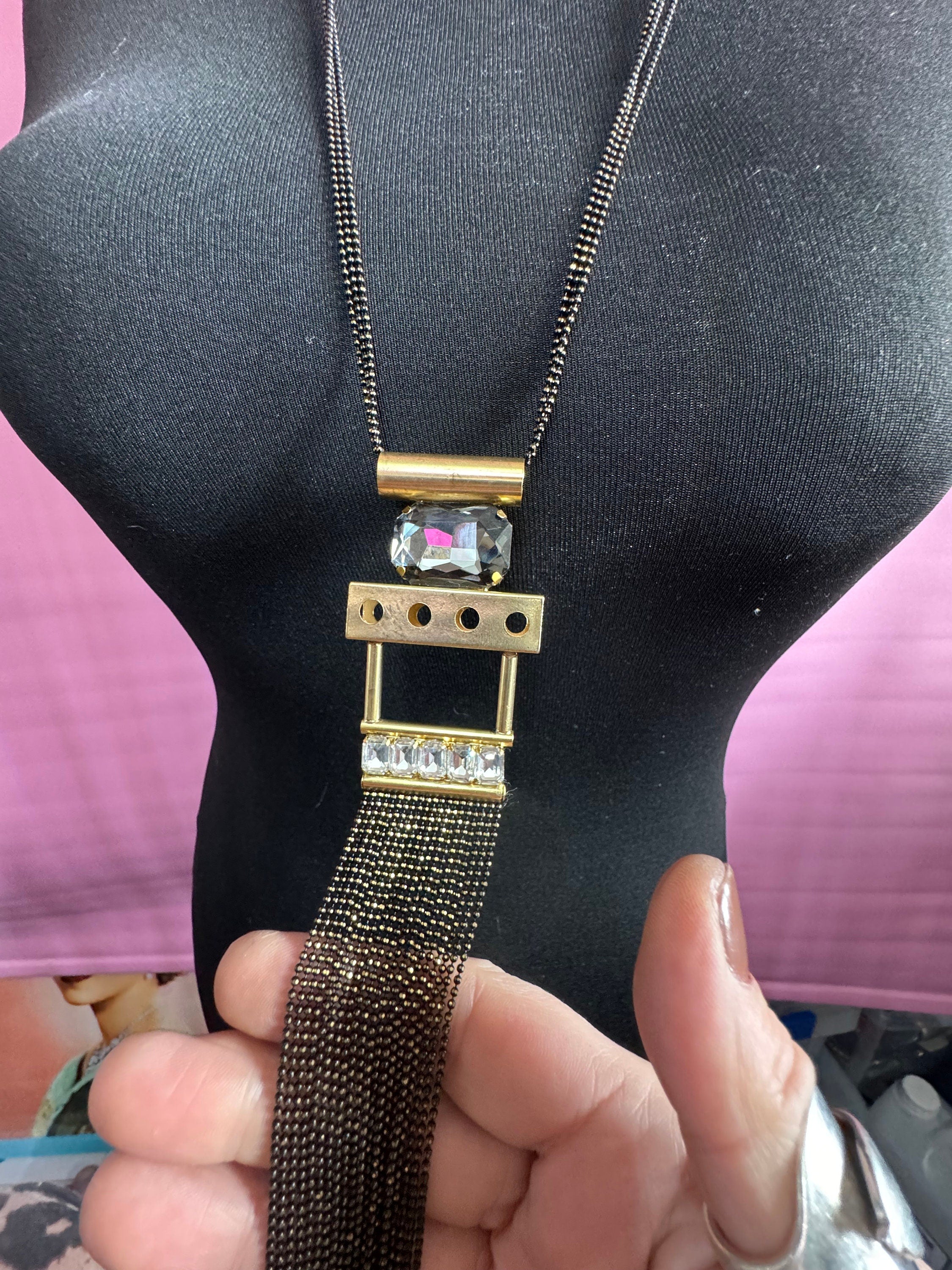 Signed Karine Sultan designer black and gold long medallion pendant tassel drop necklace couture