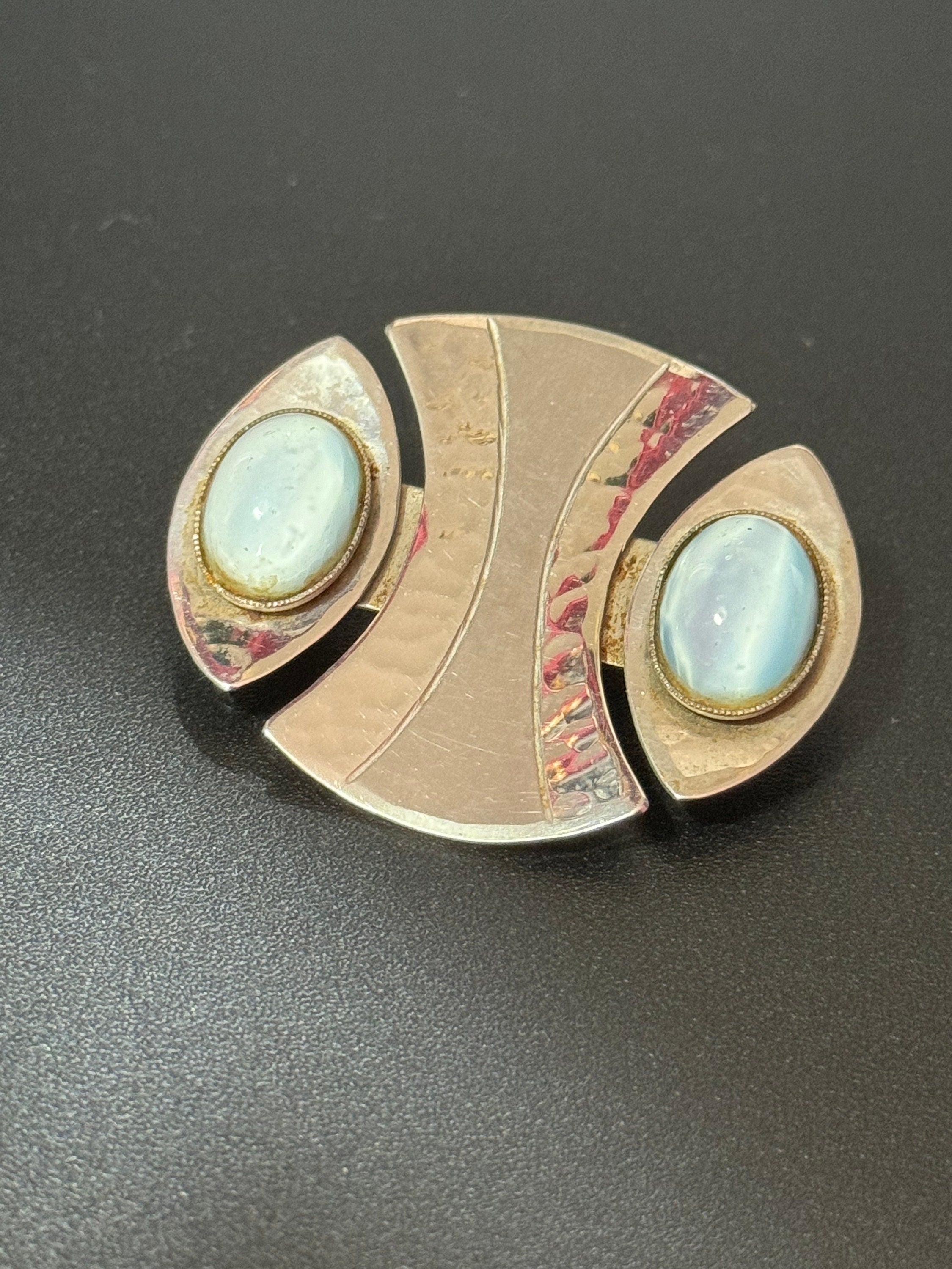 Signed MODA Malta Modernist silver tone stainless steel brooch with blue grey oval cabochons