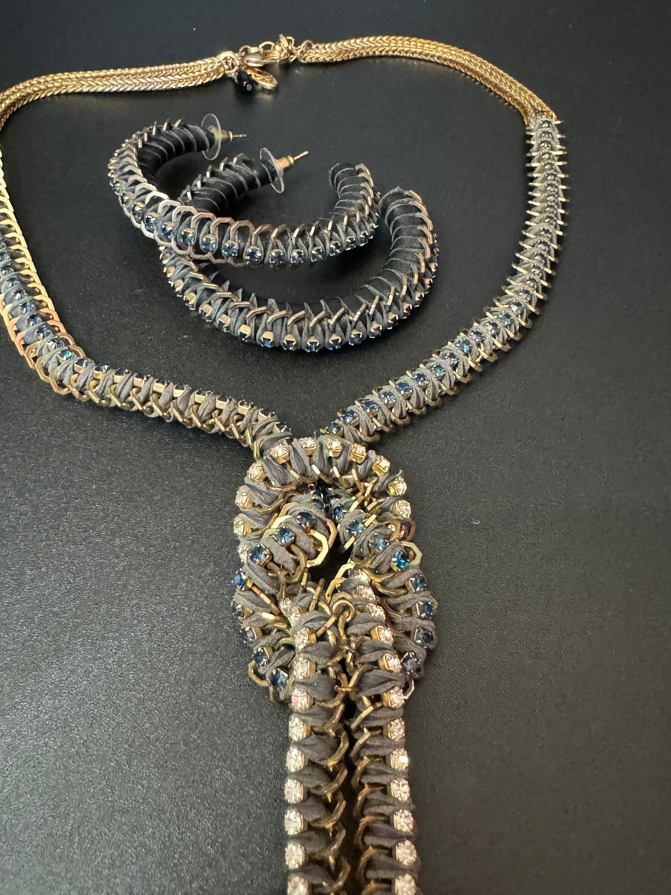 Retro dark blue and clear Swarovski crystal diamanté and grey leather gold tone diamanté knot pendant necklace and matching hoop earrings