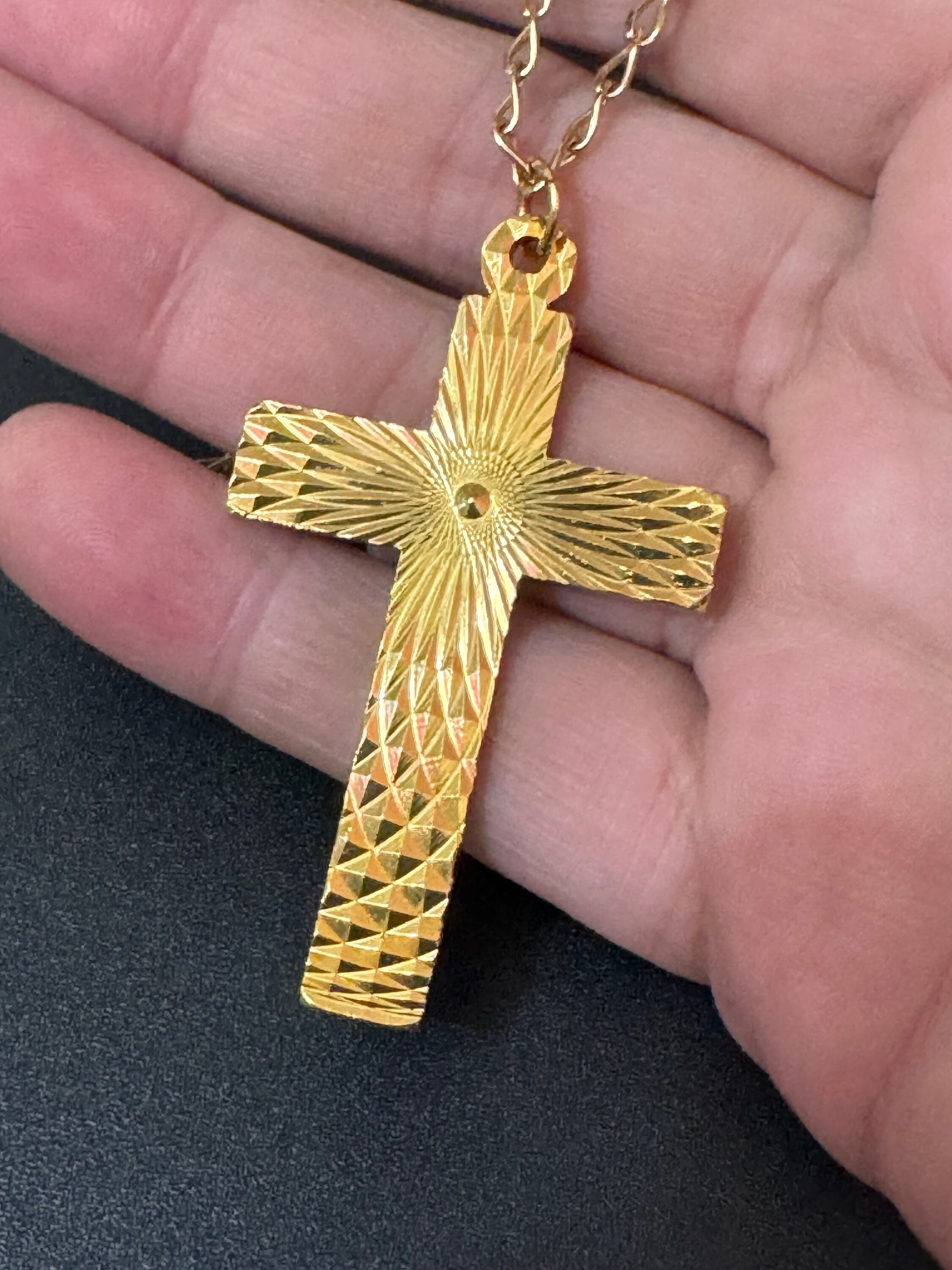 Vintage 1970s bright gold tone religious cross gold tone metal pendant on a 51cm chain