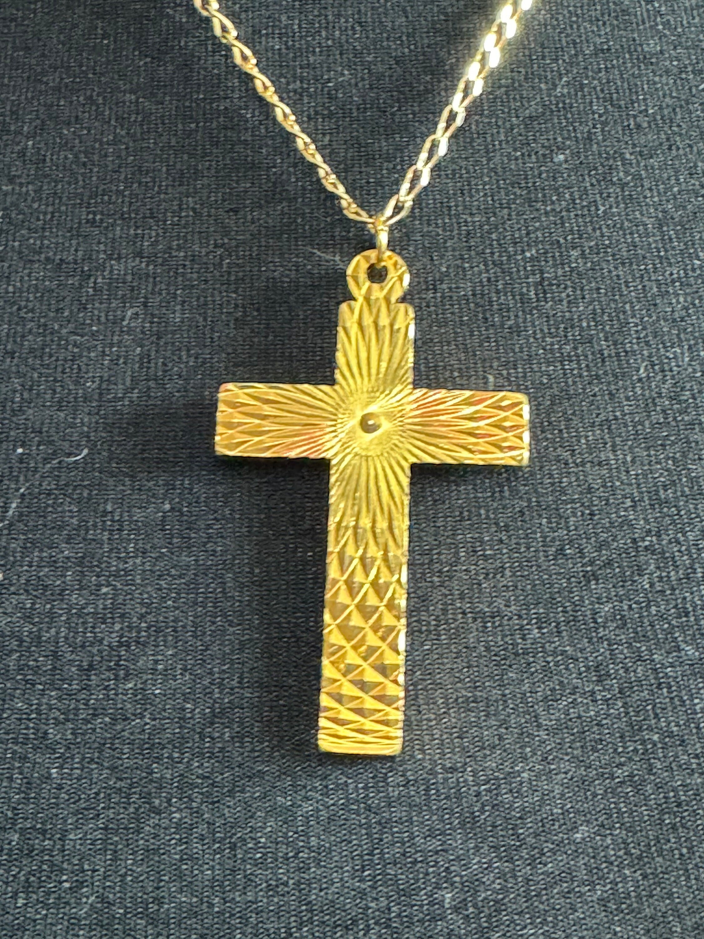 Vintage 1970s bright gold tone religious cross gold tone metal pendant on a 51cm chain