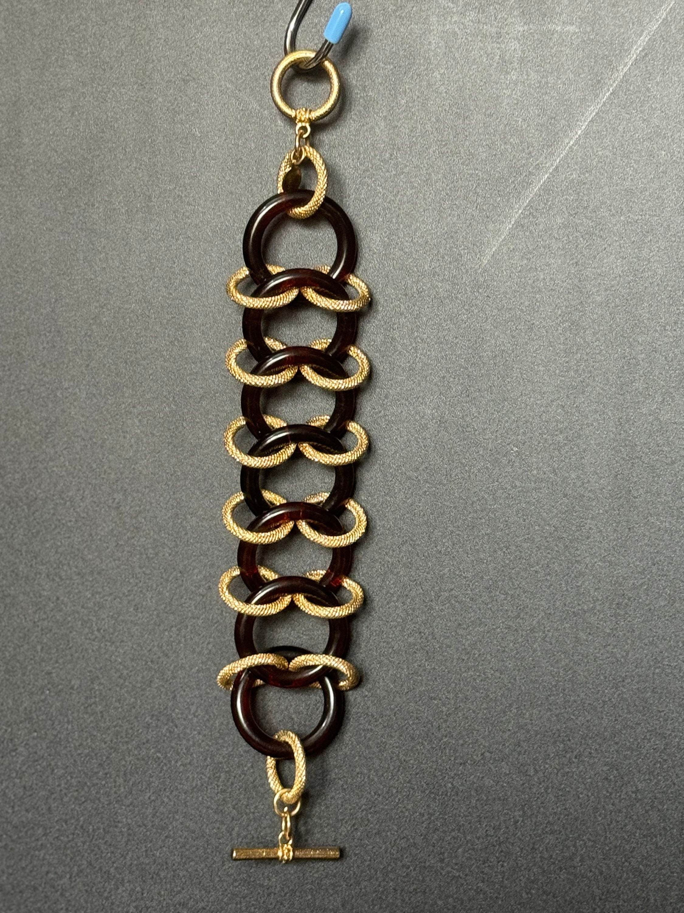 Signed KJL gold tone and faux tortoiseshell plastic link chunky wide curb link chain bracelet toggle closure