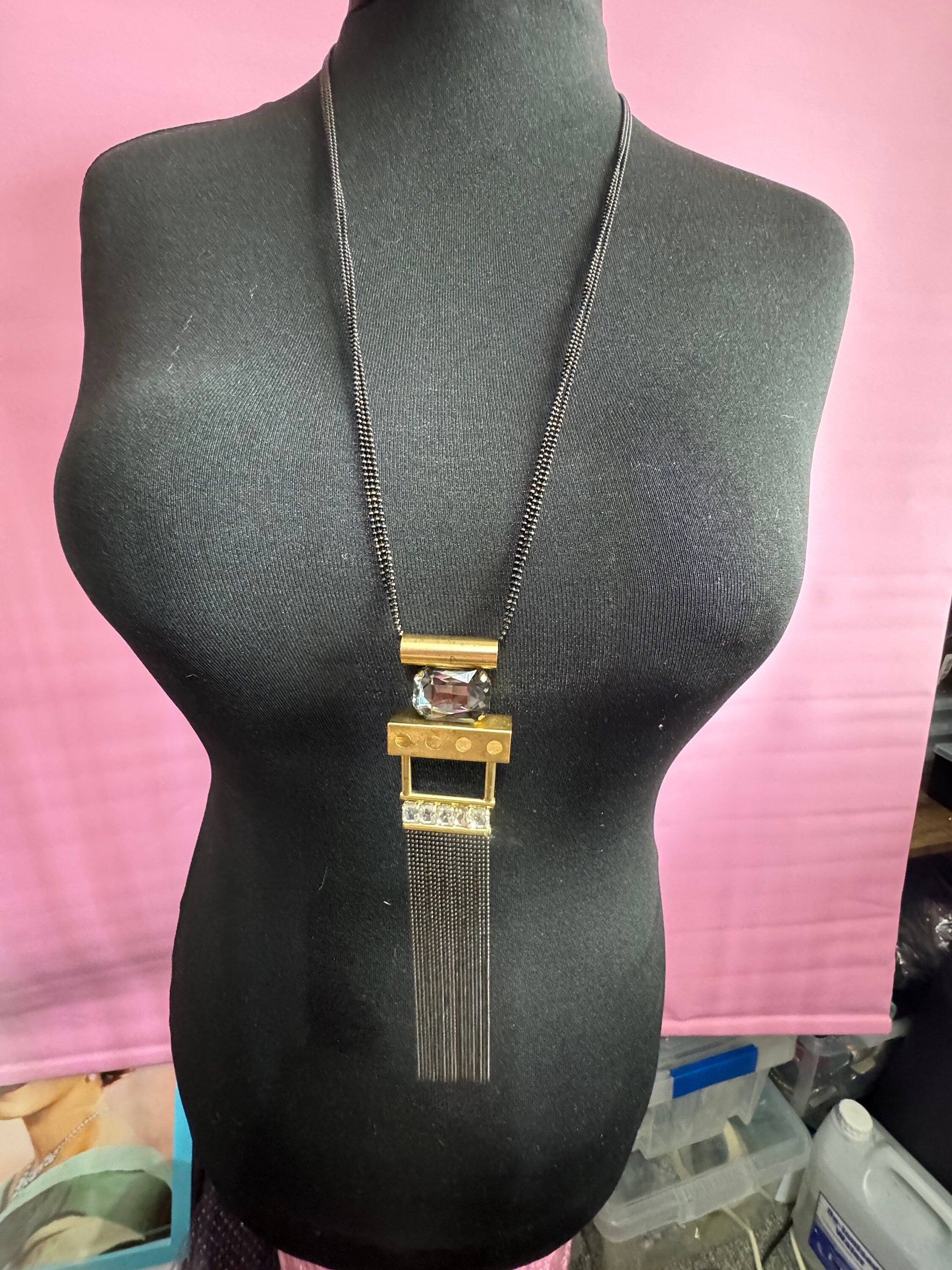 Signed Karine Sultan designer black and gold long medallion pendant tassel drop necklace couture