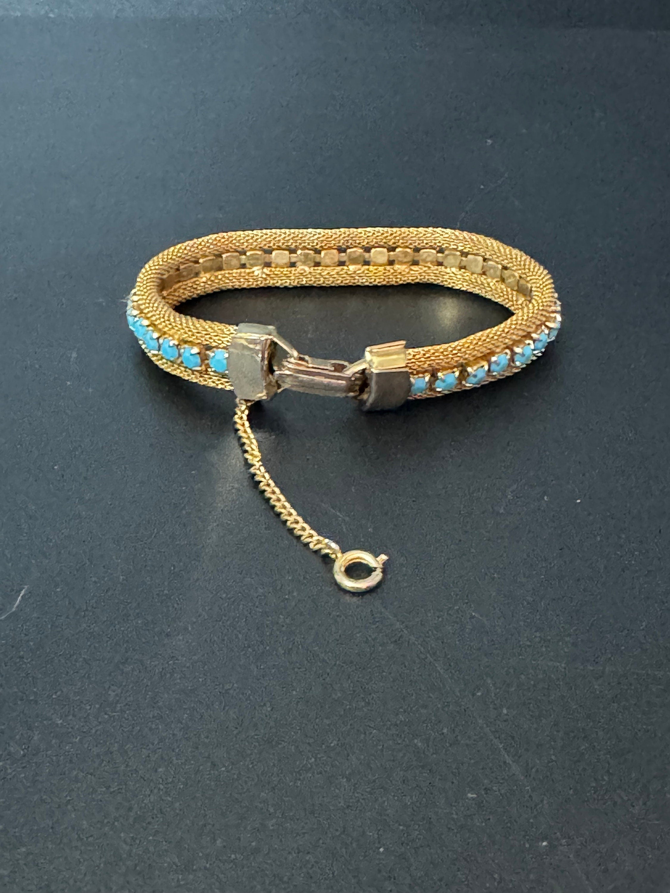 Vintage gold tone mesh rhinestone cuff bracelet with turquoise blue paste