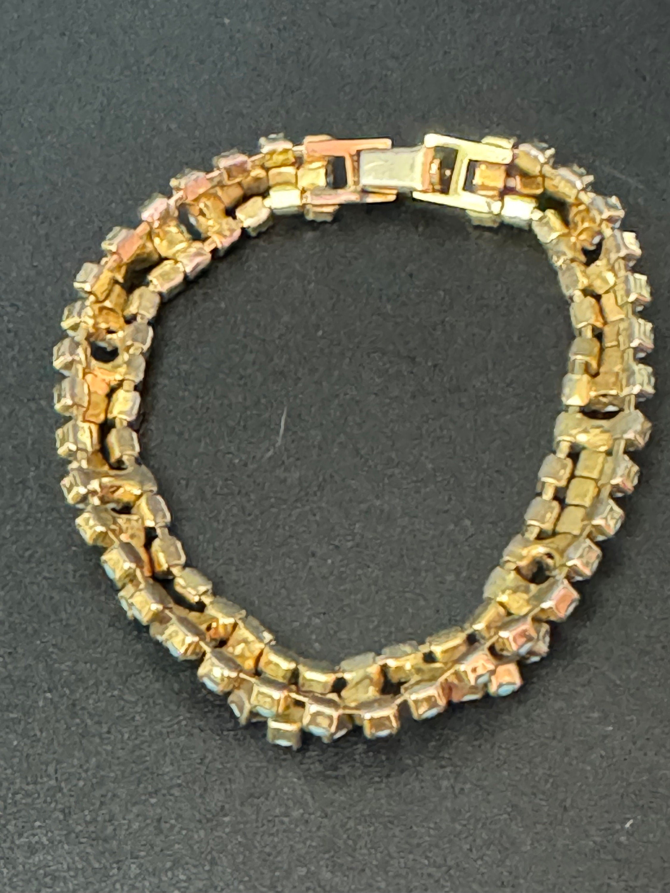 Vintage articulated flat link mesh gold tone bracelet with turquoise blue paste