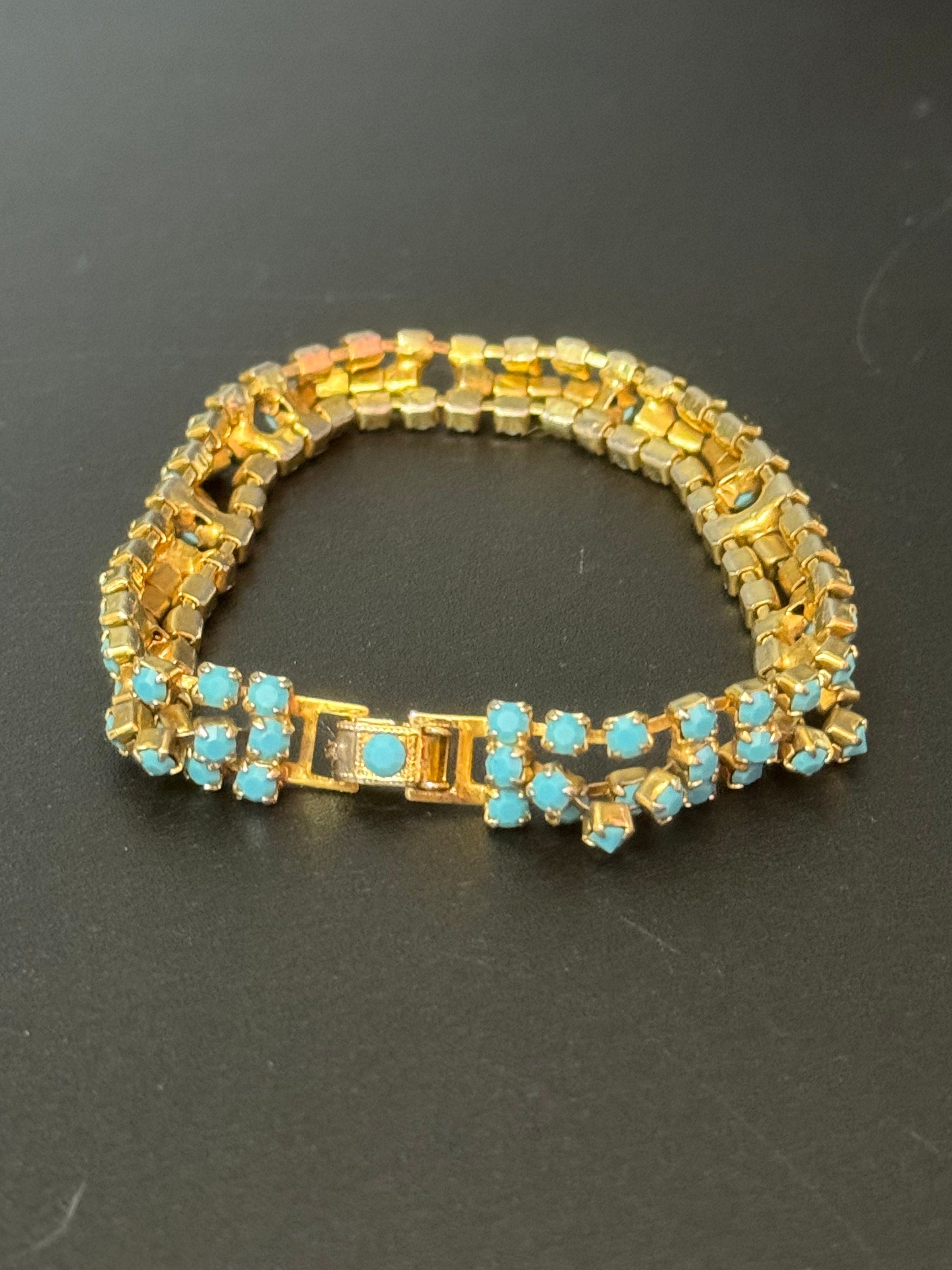 Vintage articulated flat link mesh gold tone bracelet with turquoise blue paste