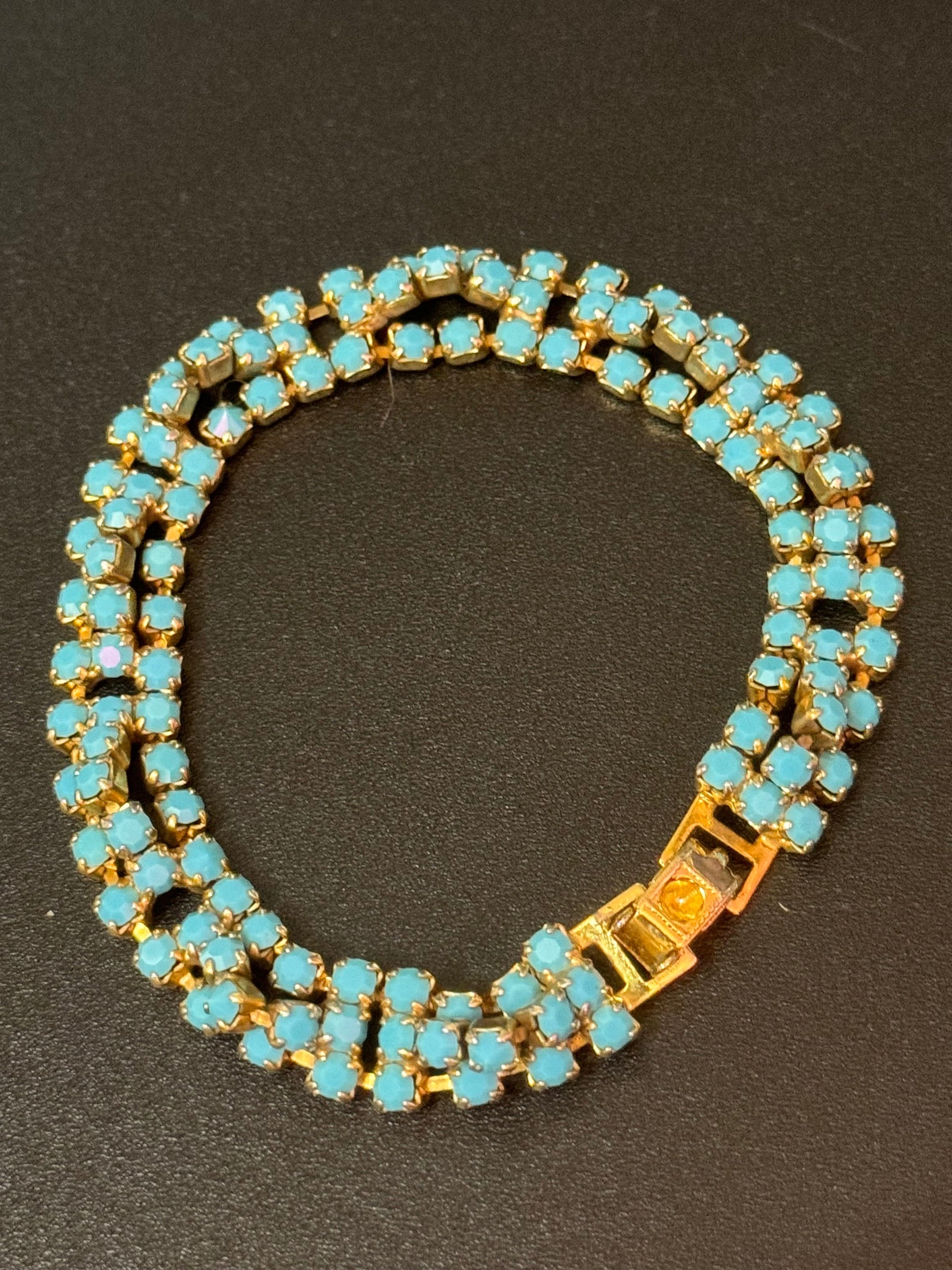 Vintage articulated flat link mesh gold tone bracelet with turquoise blue paste