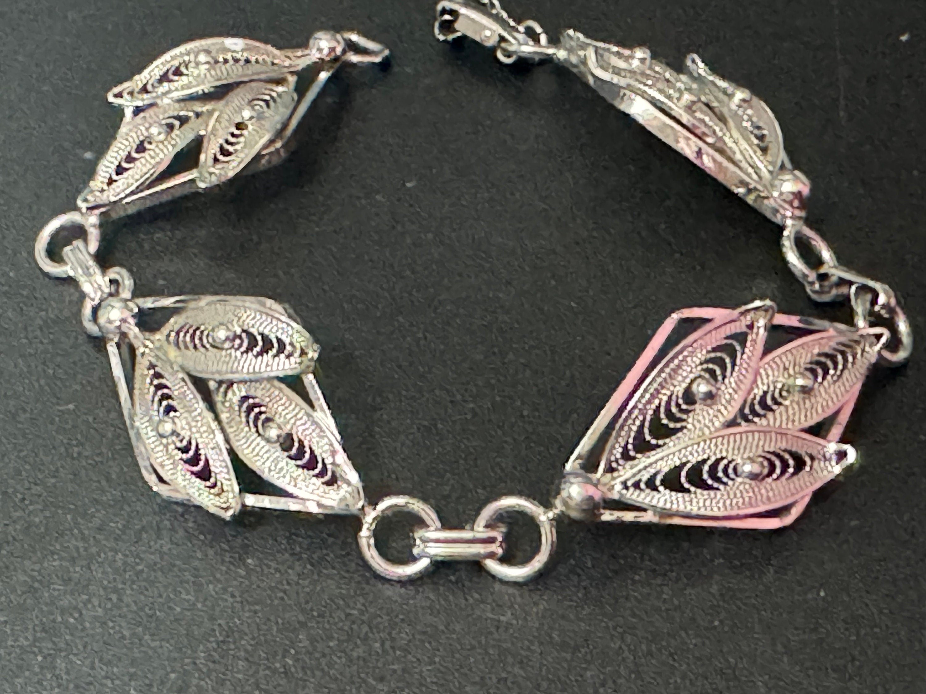 Silver tone fine filigree work panel link bracelet with safety chain