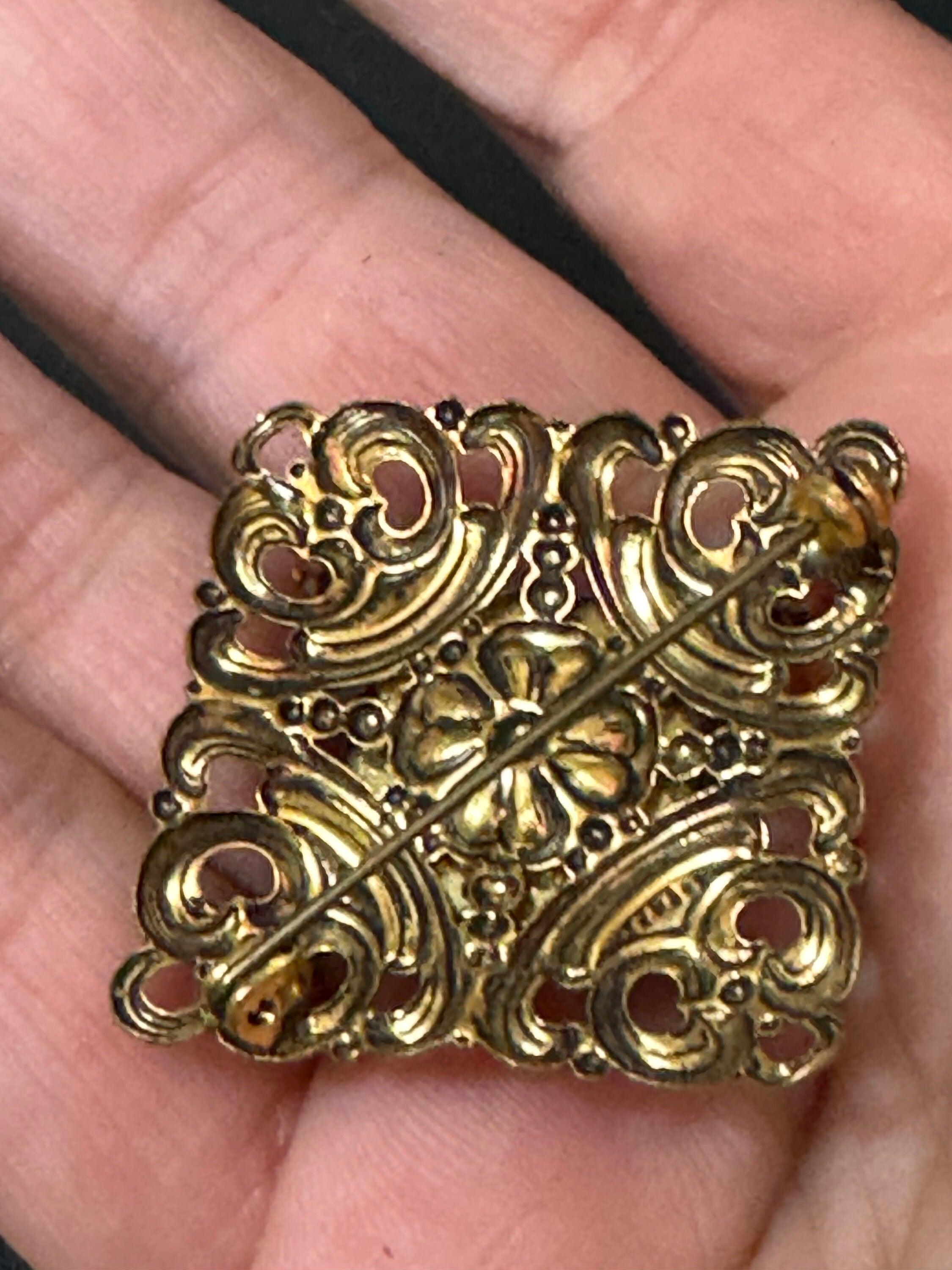 Antique Art Deco Czech brass gilt metal filigree brooch with white glass cabochon and AB rhinestones