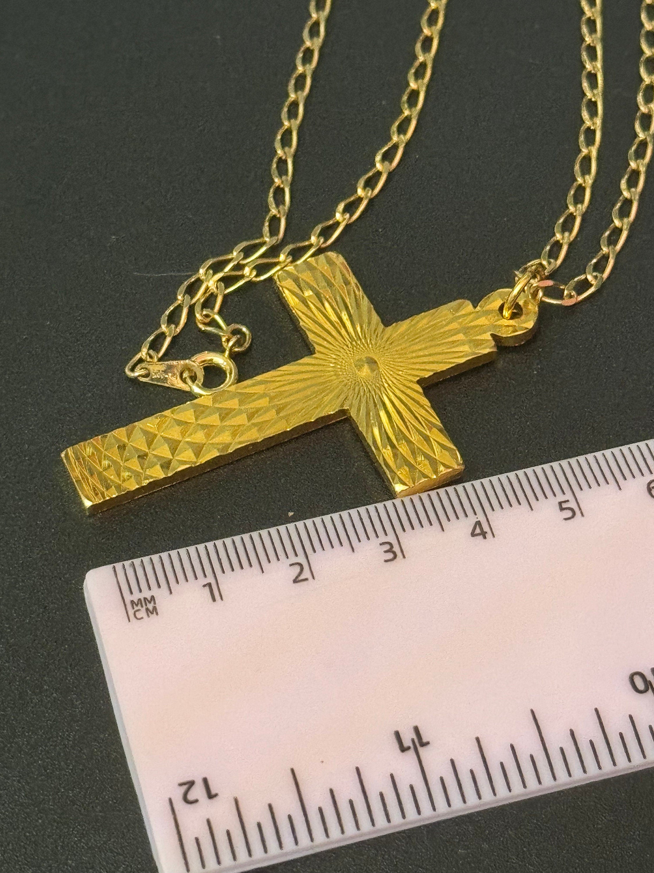 Vintage 1970s bright gold tone religious cross gold tone metal pendant on a 51cm chain