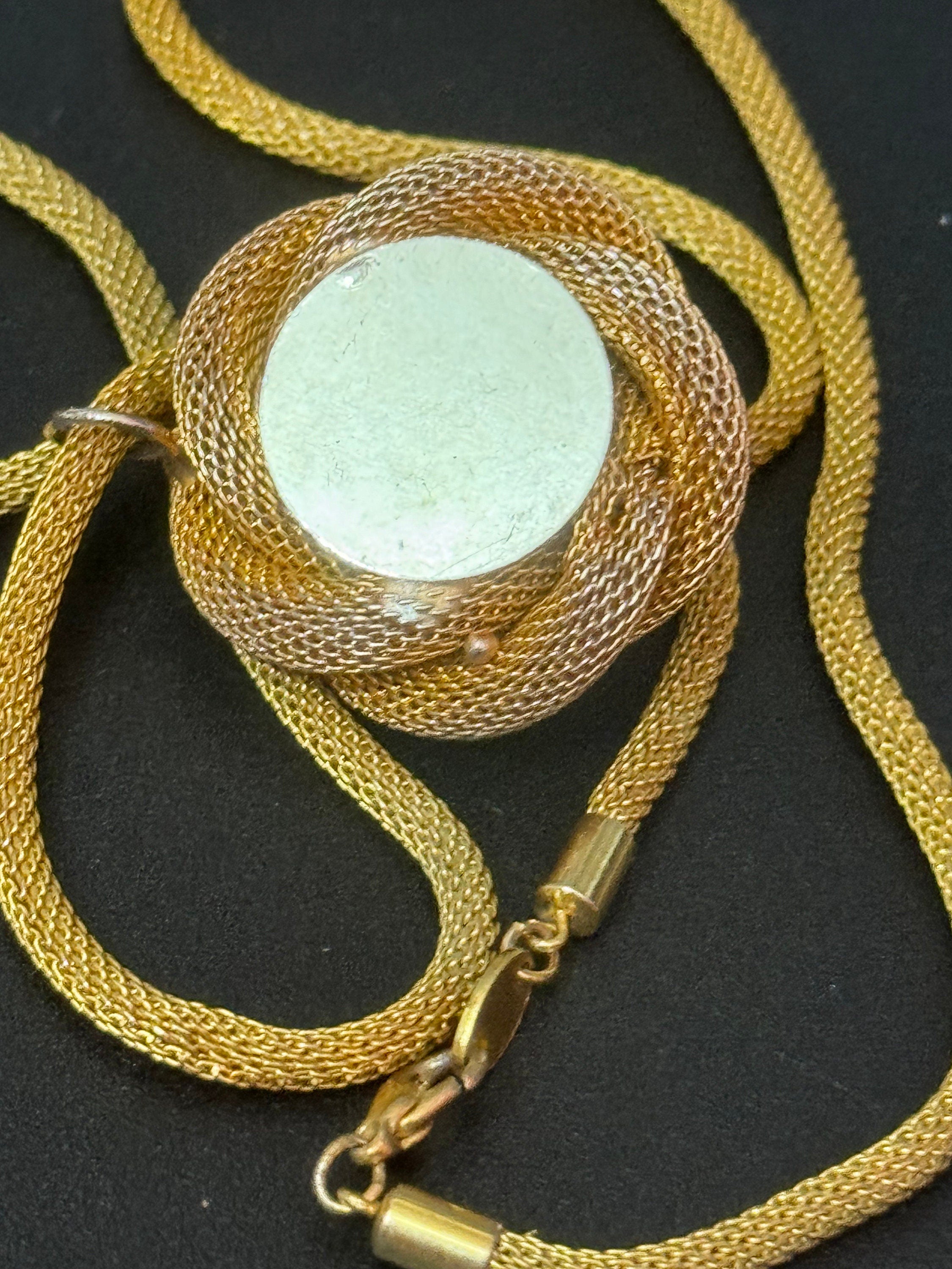 Vintage gold tone tube mesh pendant necklace with large central faux pearl
