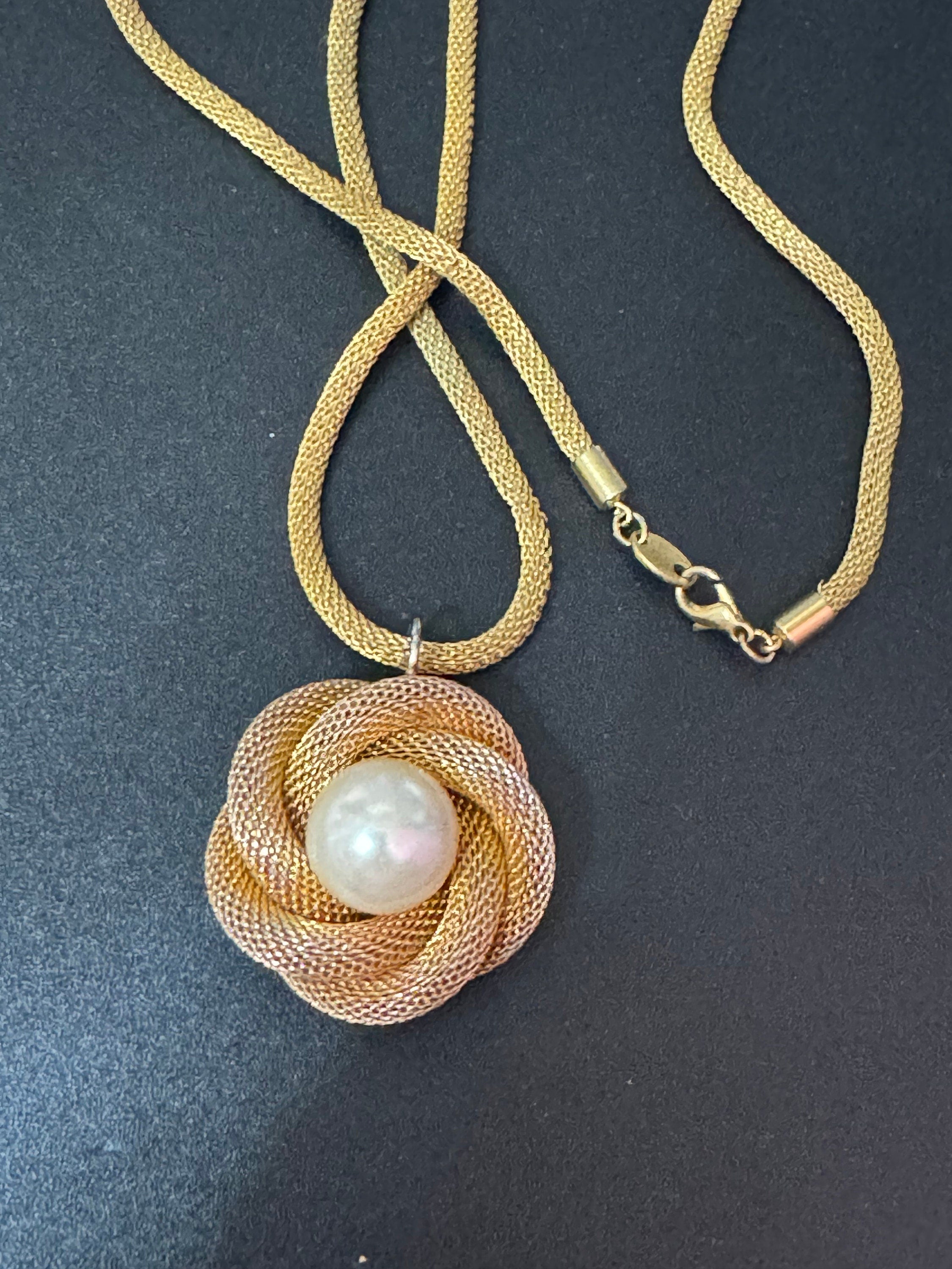Vintage gold tone tube mesh pendant necklace with large central faux pearl