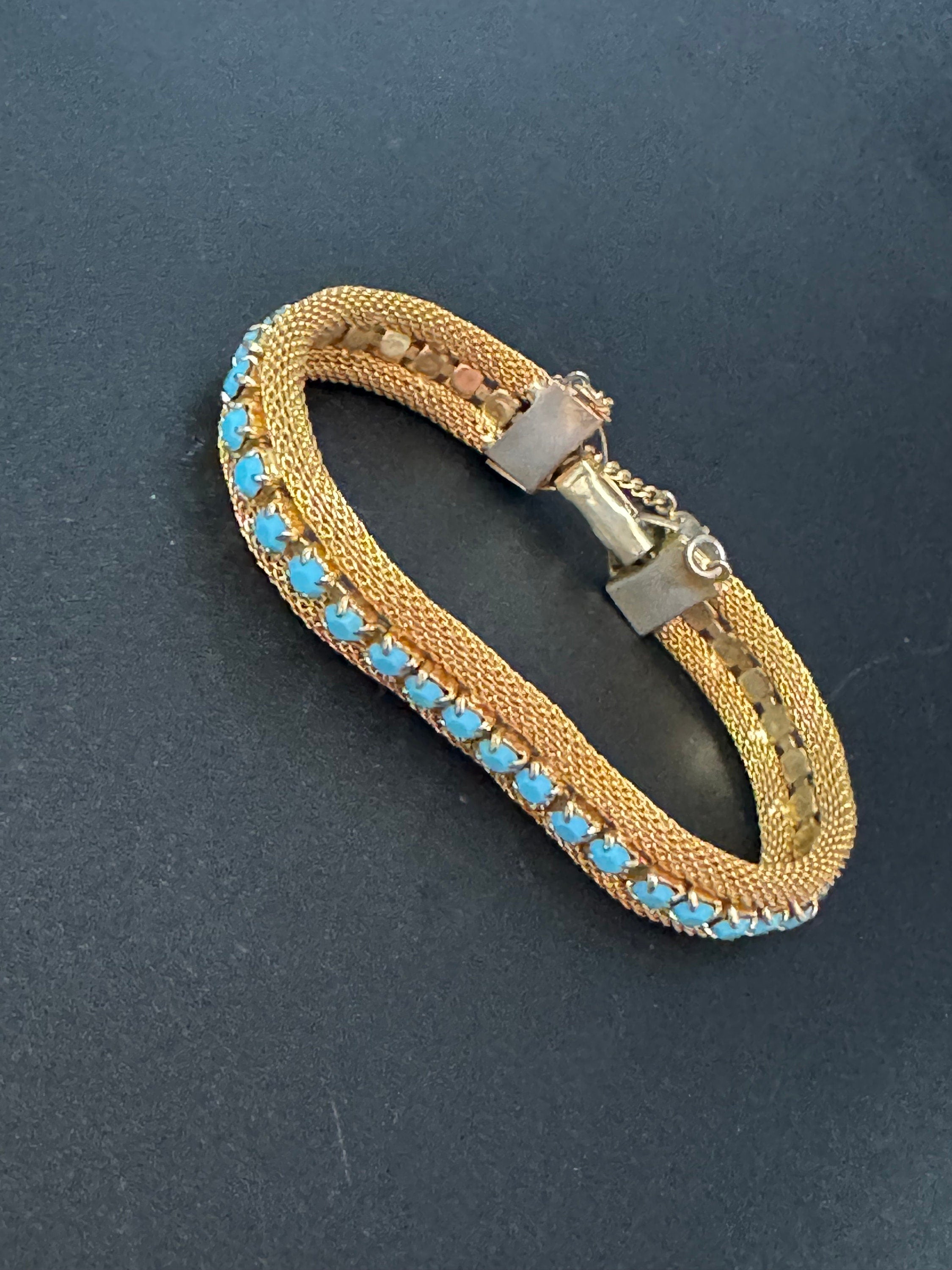 Vintage gold tone mesh rhinestone cuff bracelet with turquoise blue paste