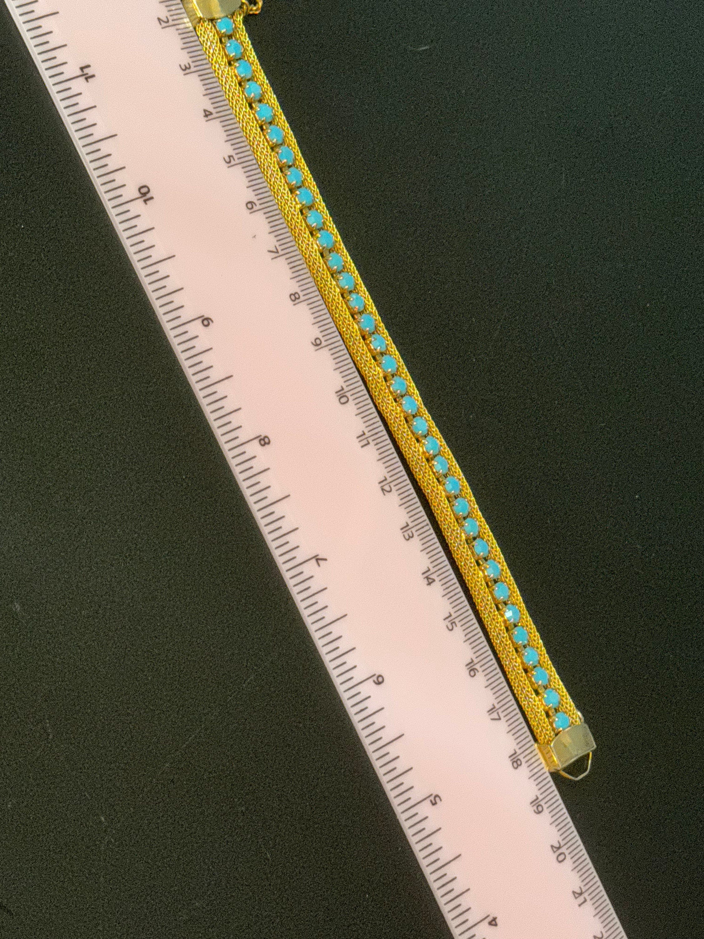 Vintage gold tone mesh rhinestone cuff bracelet with turquoise blue paste