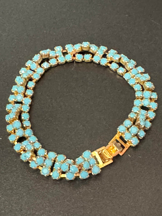 Vintage articulated flat link mesh gold tone bracelet with turquoise blue paste