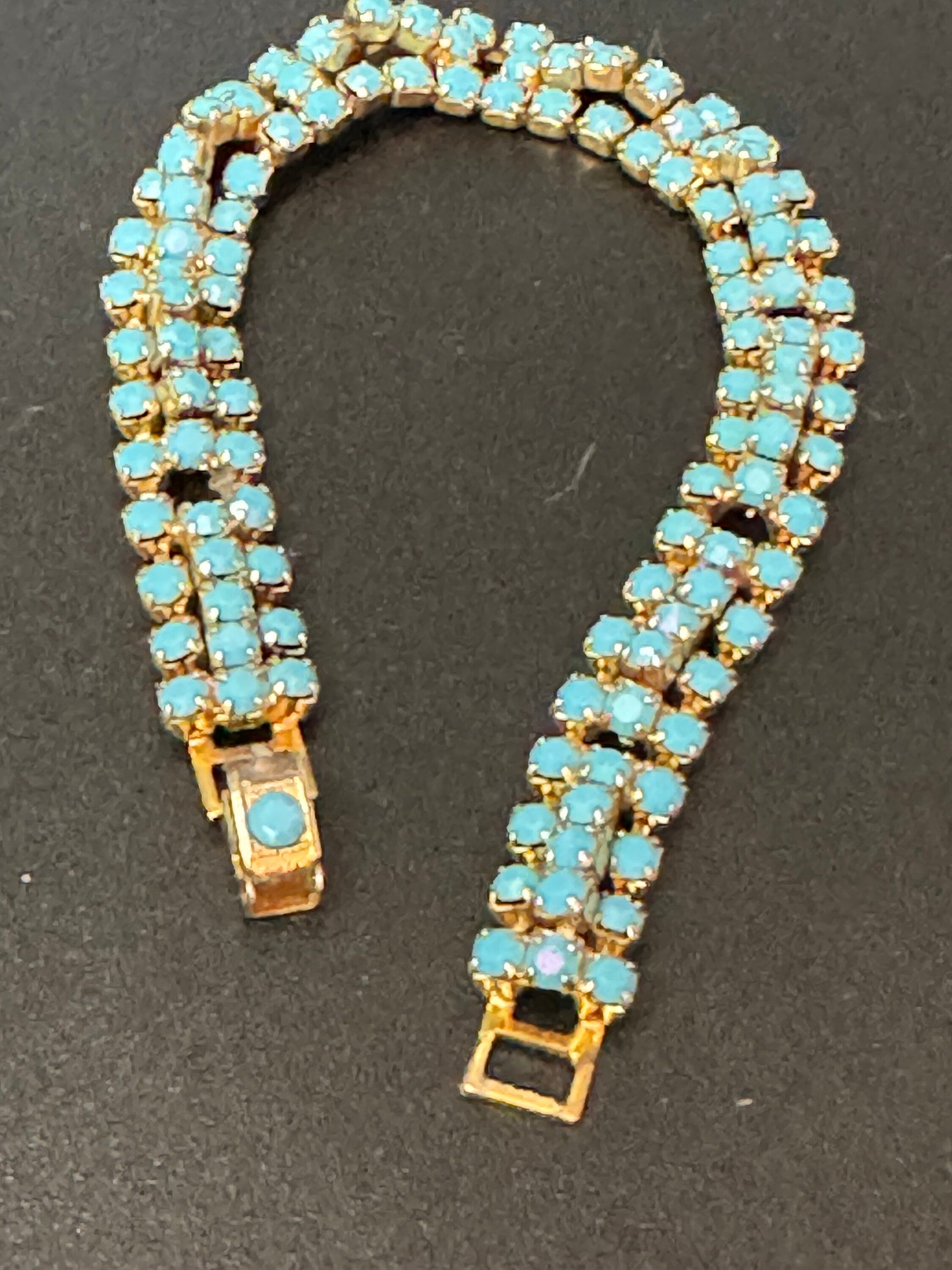 Vintage articulated flat link mesh gold tone bracelet with turquoise blue paste