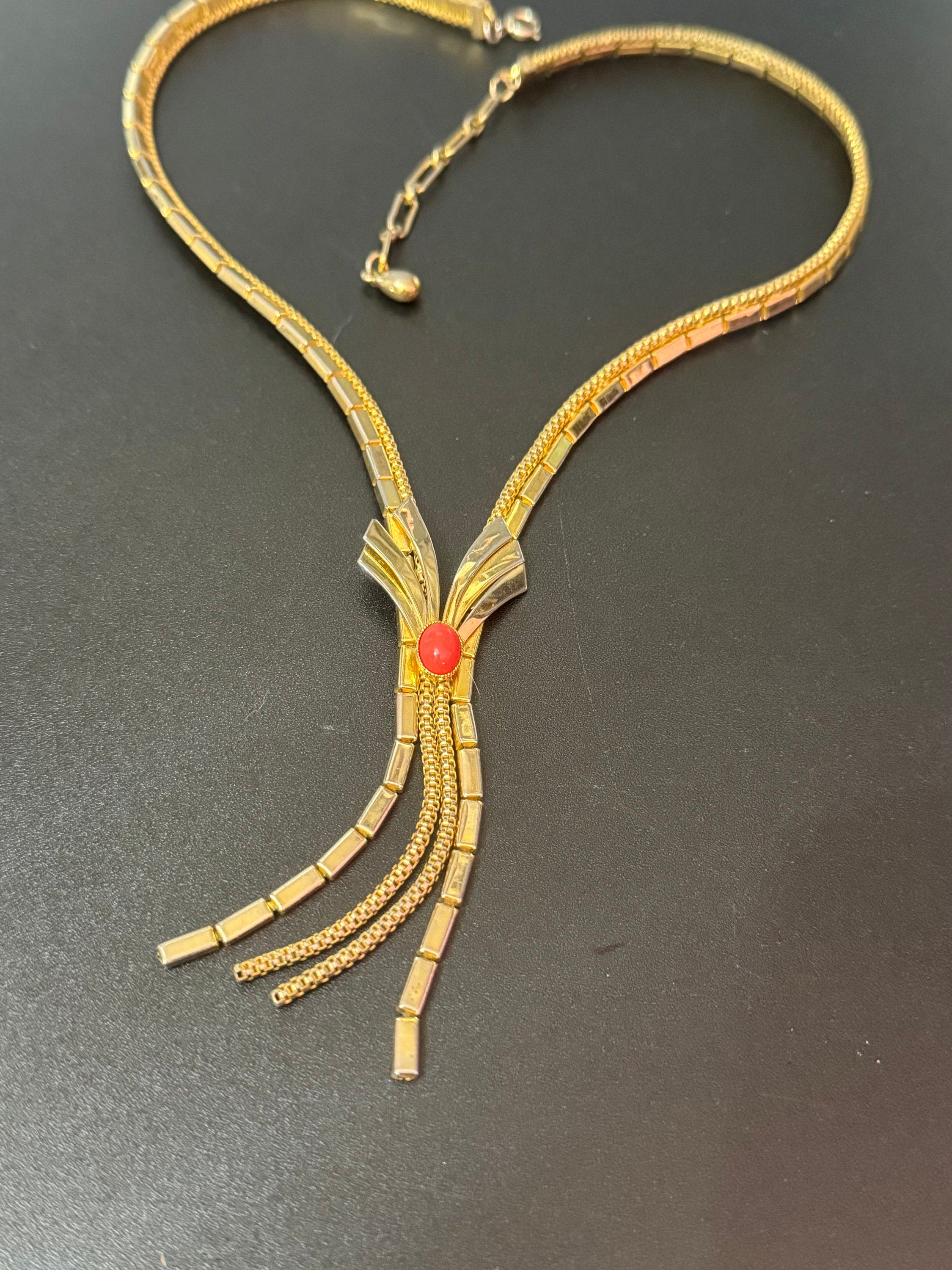 Vintage gold tone mesh lariat drop necklace with oval faux coral glass cabochon stone