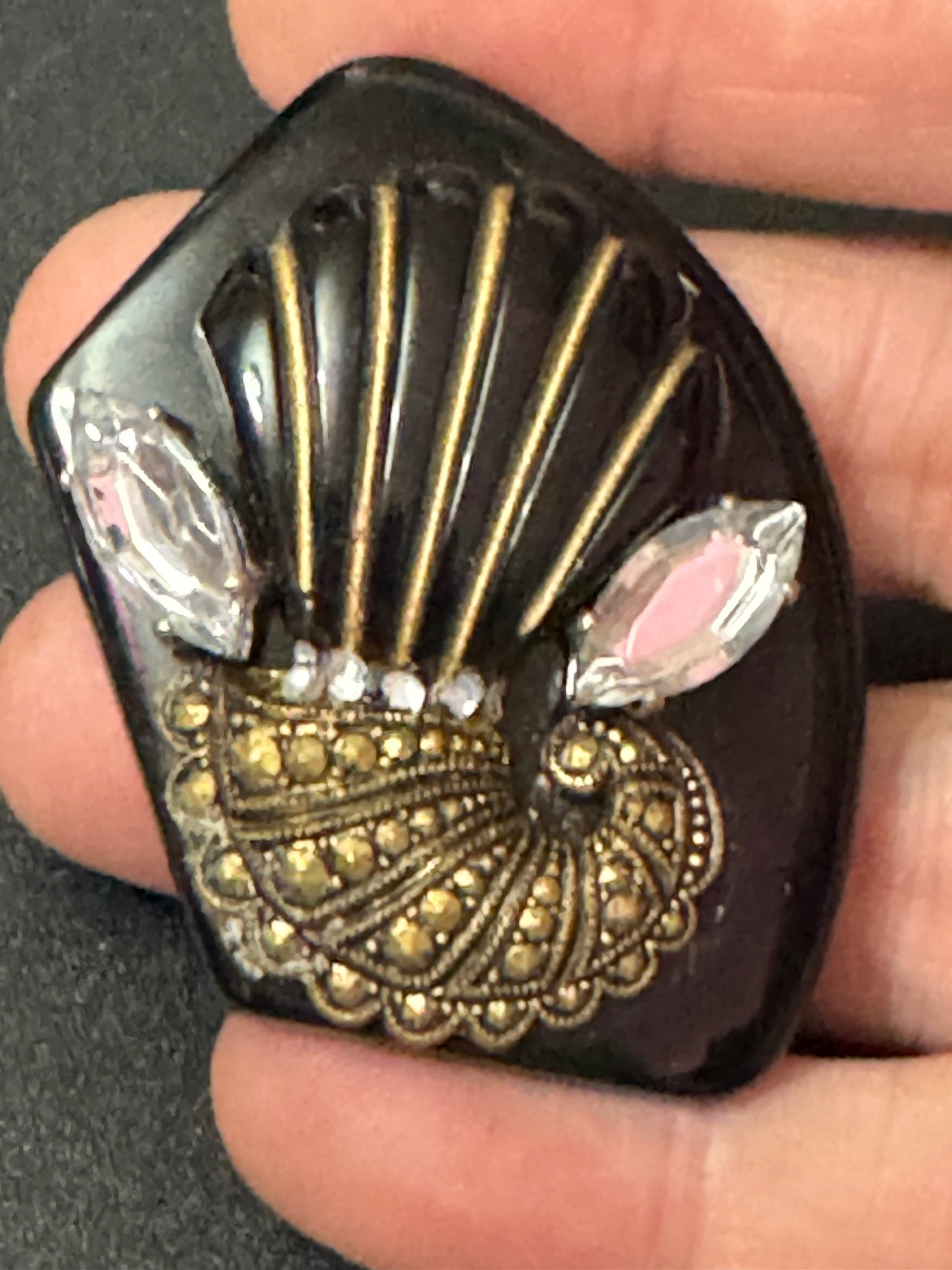 Vintage gold tone black early plastic rhinestone cornucopia brooch